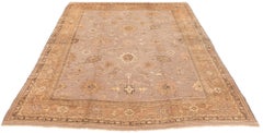 Antique Oushak Wool Rug with Muted Colors and Low Pile