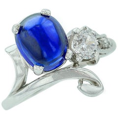 Antique Oval Blue Sapphire Cabochon and White Diamond Ring
