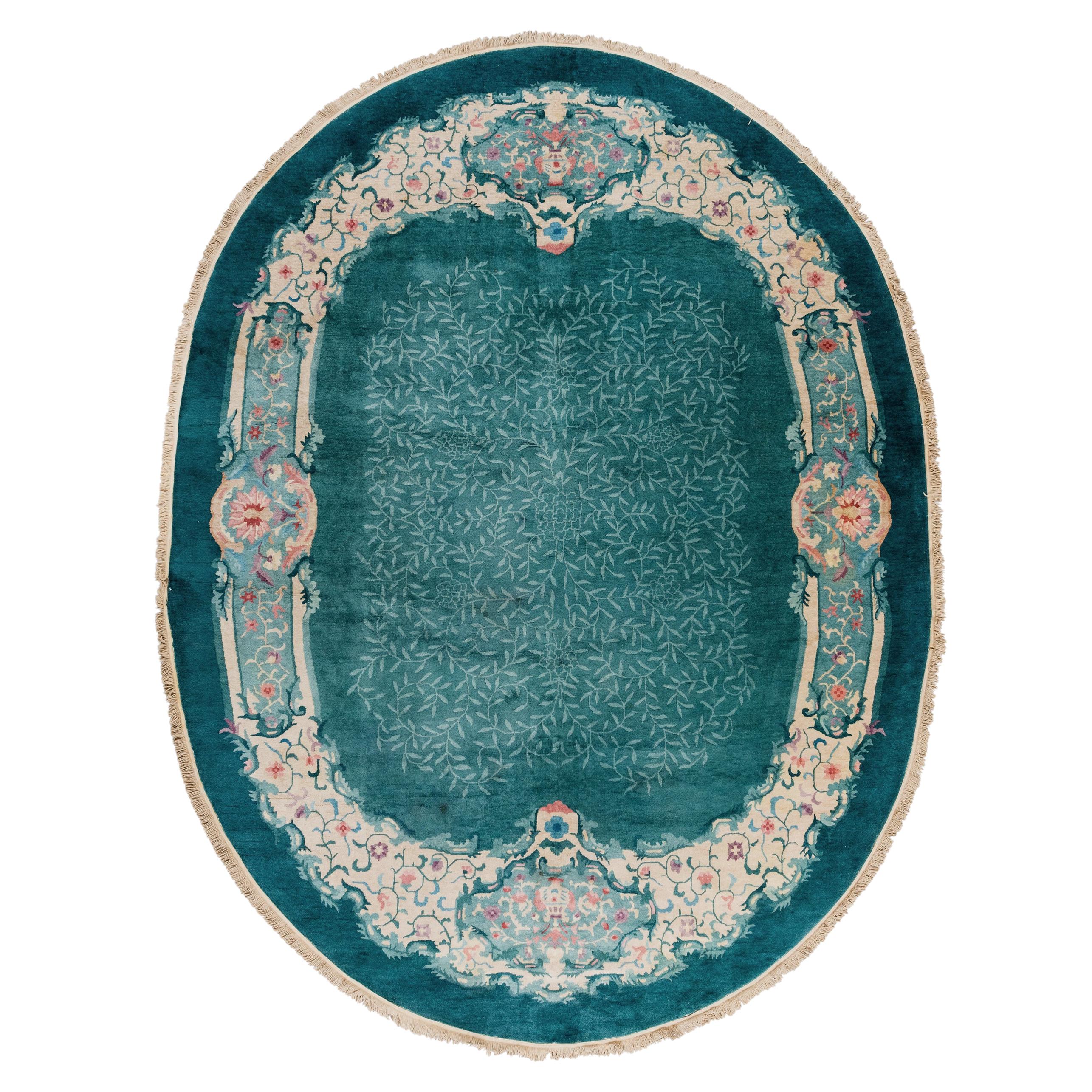 Antique Oval Chinese Rug in Turquoise with Coral and Violet Flower Blossoms For Sale
