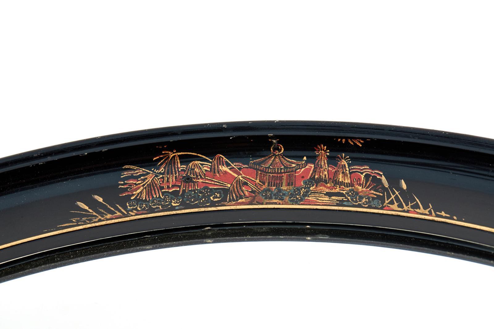 Antique Oval Chinoiserie Lacquered Decorated Wall Mirror with original bevelled glass mirror plate. Good original antique condition.