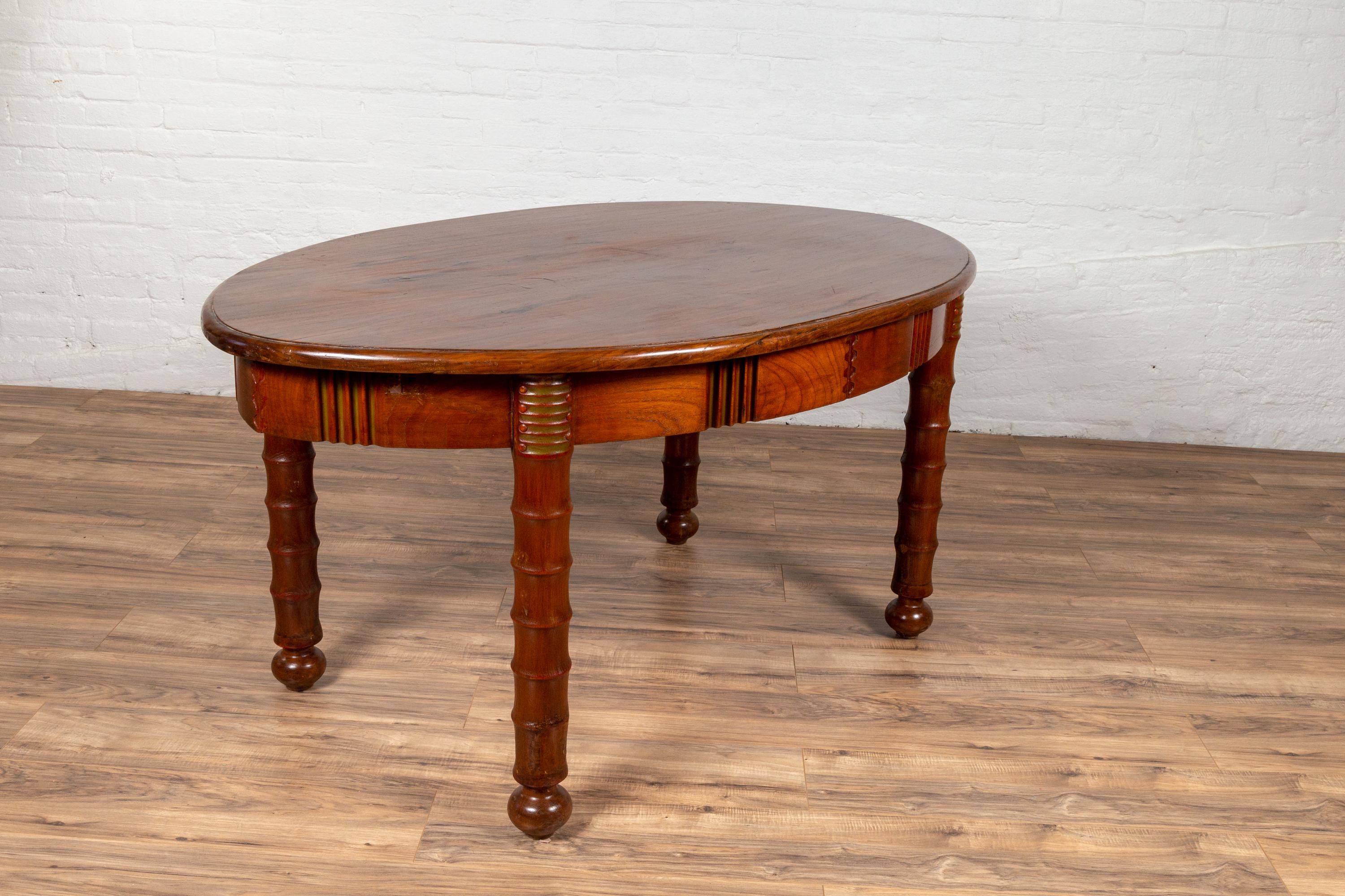 Antique Oval Dining Room Table from Indonesia with Spindle Legs and Warm Patina For Sale 4