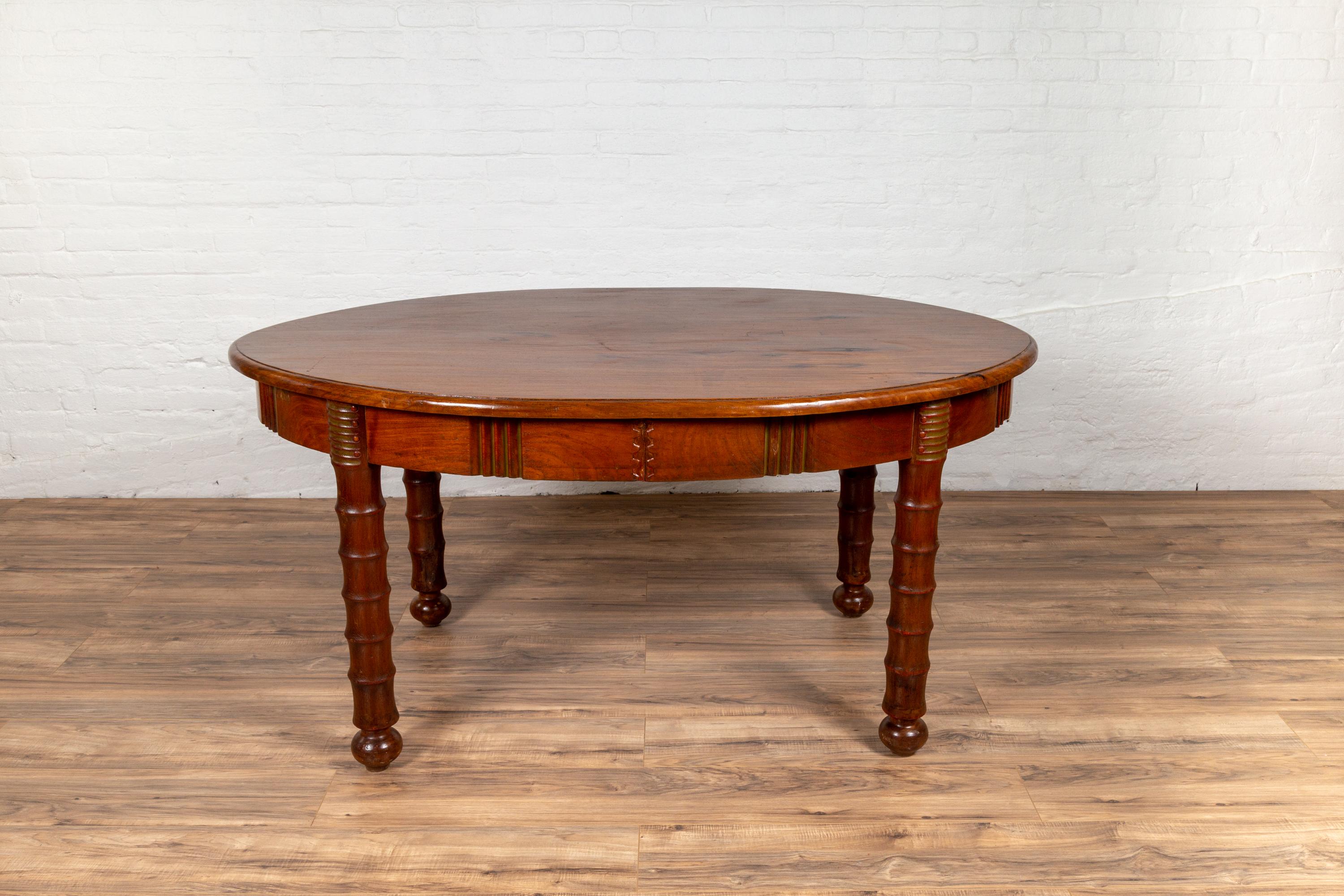Antique Oval Dining Room Table from Indonesia with Spindle Legs and Warm Patina For Sale 7