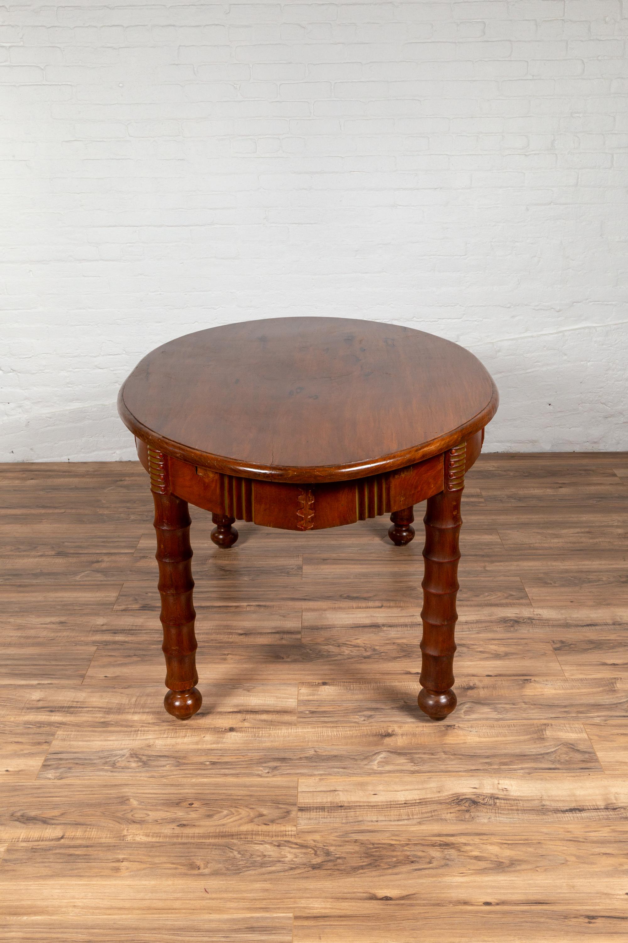 Antique Oval Dining Room Table from Indonesia with Spindle Legs and Warm Patina For Sale 9