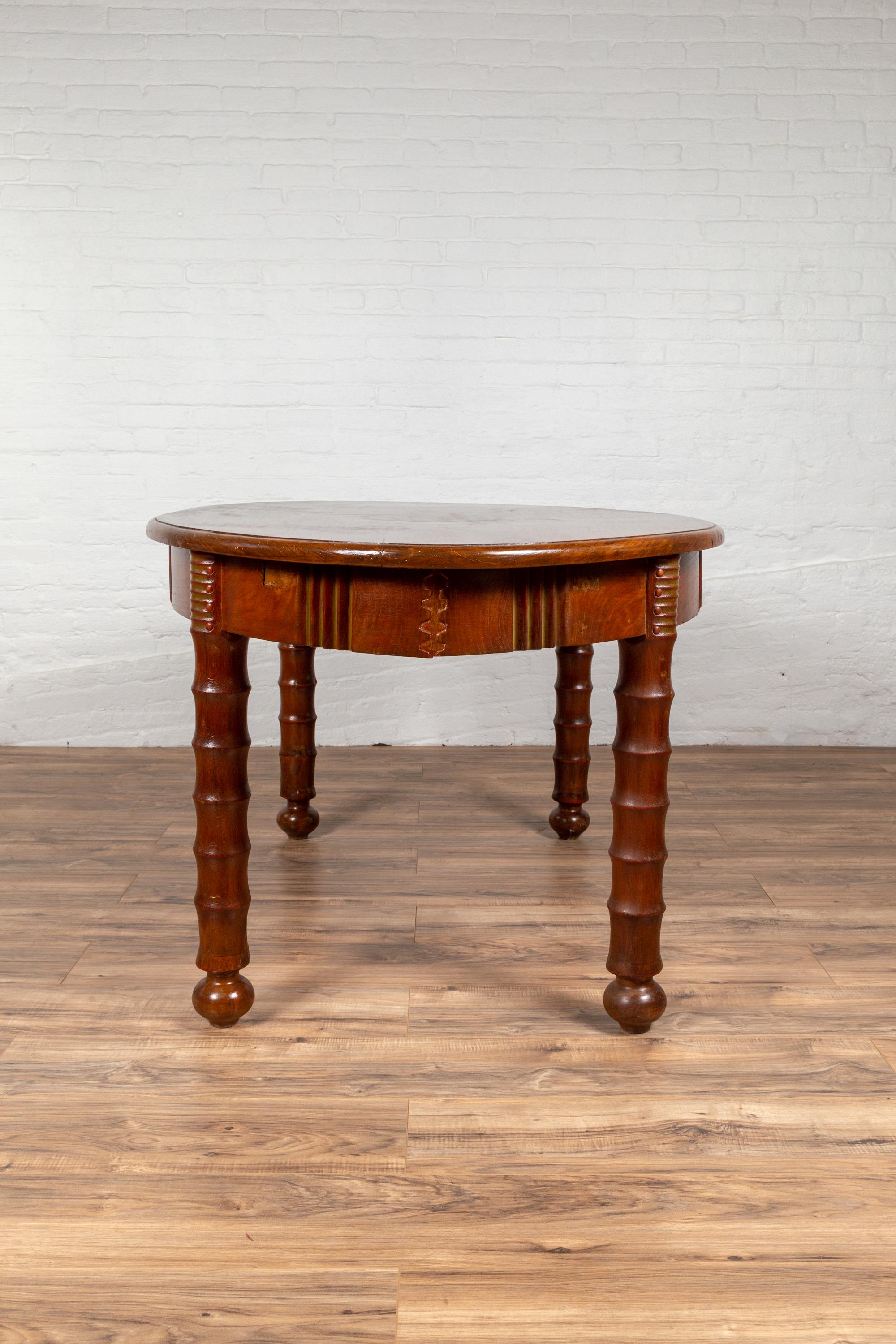 Antique Oval Dining Room Table from Indonesia with Spindle Legs and Warm Patina For Sale 10
