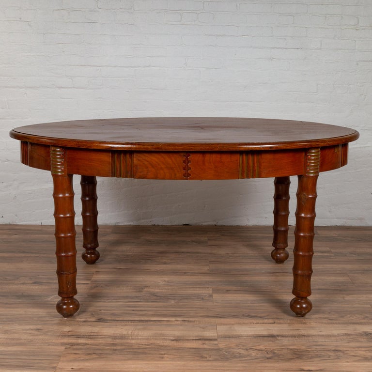 Antique Oval Dining Room Table from Indonesia with Spindle Legs and Warm Patina For Sale at 1stdibs