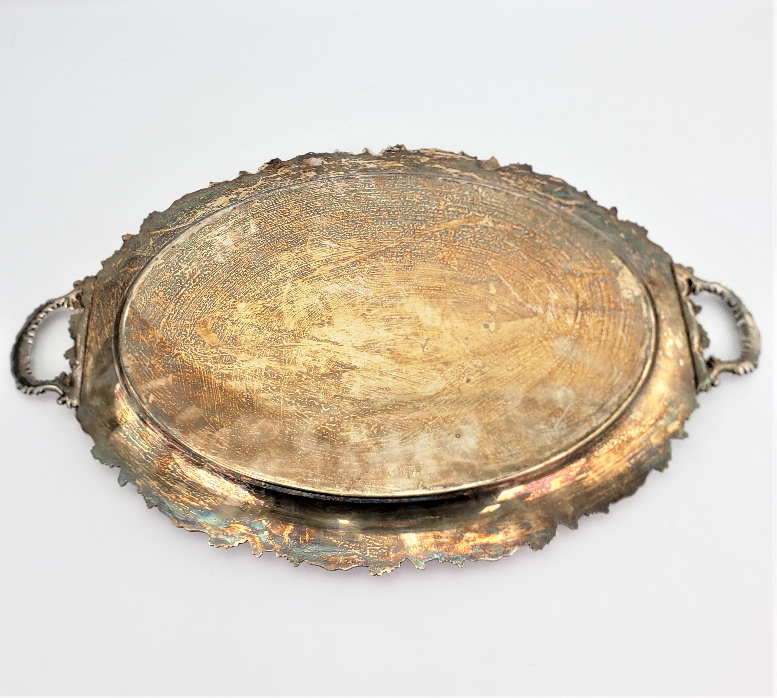 20th Century Antique Oval English Silver Plated Serving Tray with Grape and Leaf Decoration
