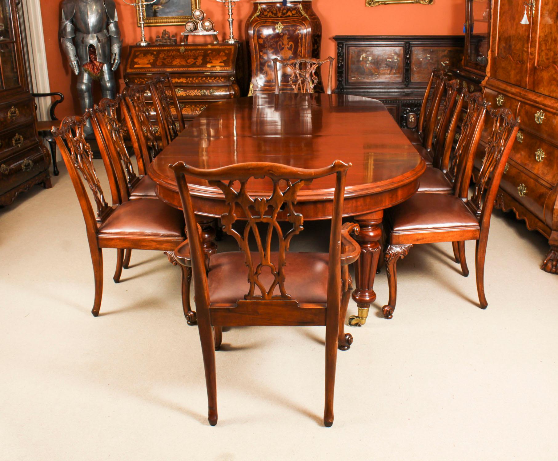 This is a fabulous antique Victorian flame mahogany extending dining table, circa 1860 in date and a matching set of  ten Chippendale Revival dining chairs. 

The table has three original leaves, can comfortably seat ten and has been hand-crafted