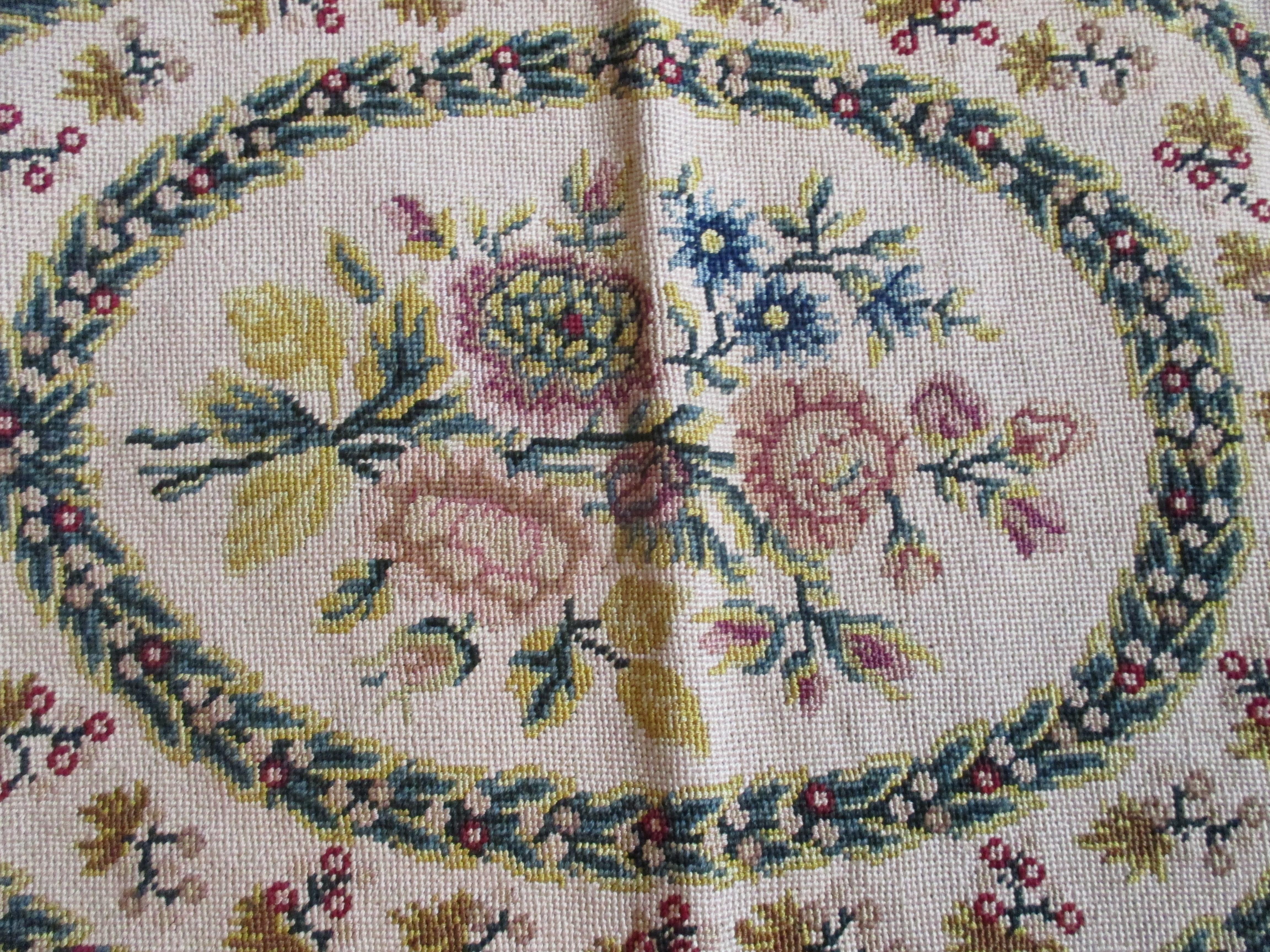 Antique oval seat cover with roses at the center
In shades of yellow, red and blue
Numbered: 35104/16205
Size: 17