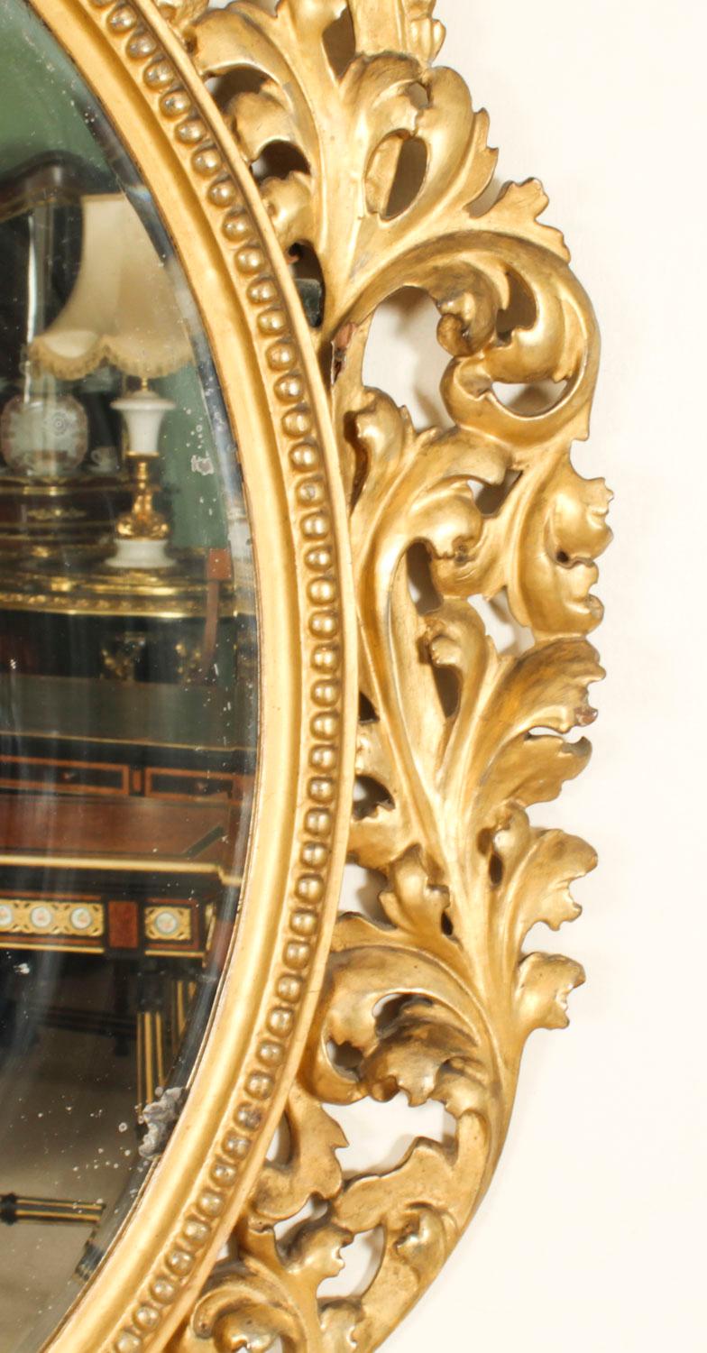 Italian Antique Oval Florentine Giltwood Mirror 19th Century 120x92cm For Sale