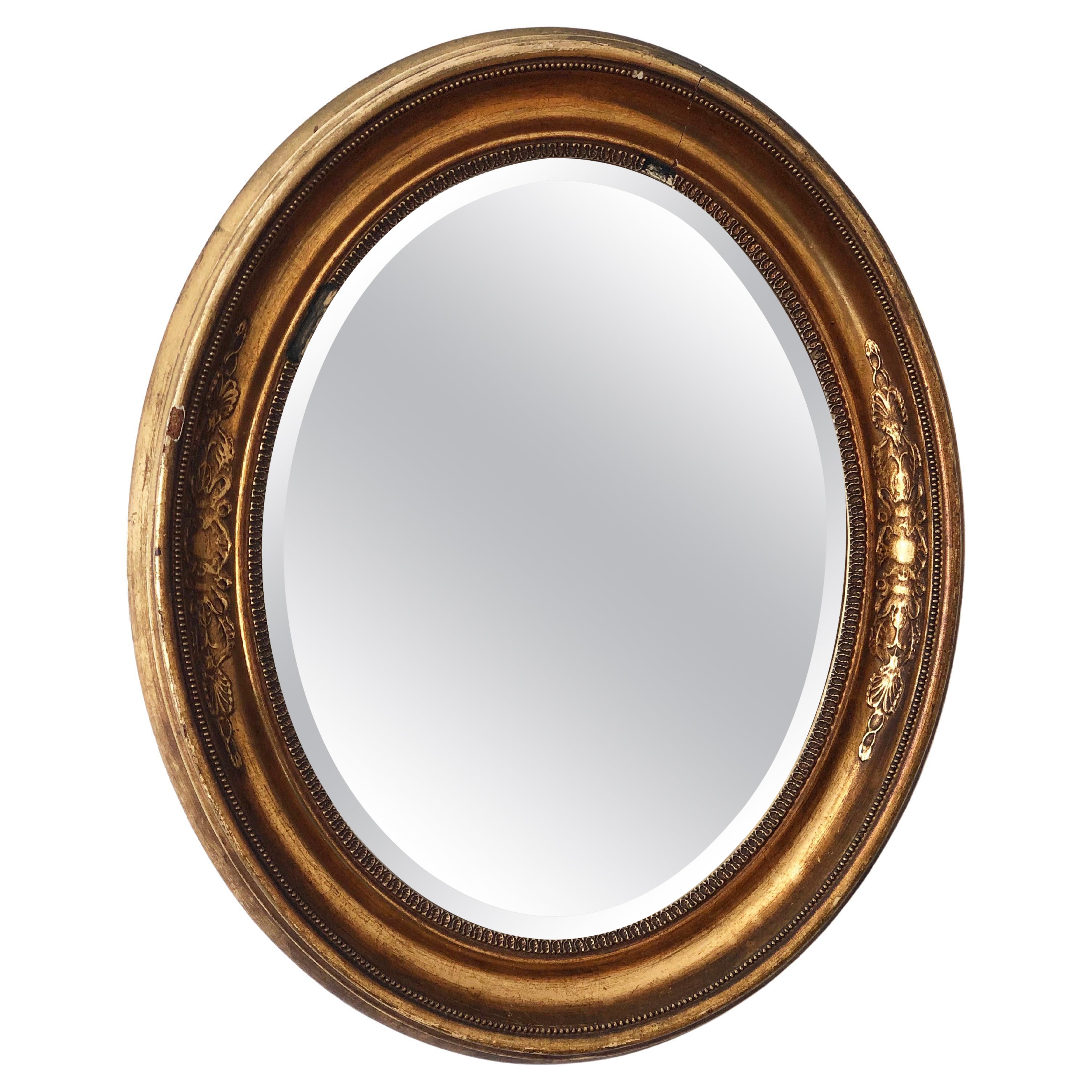 Antique Mirror ovale in legno dorato Francia Fine Ottocento