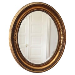 Antique Mirror ovale in legno dorato Francia Fine Ottocento