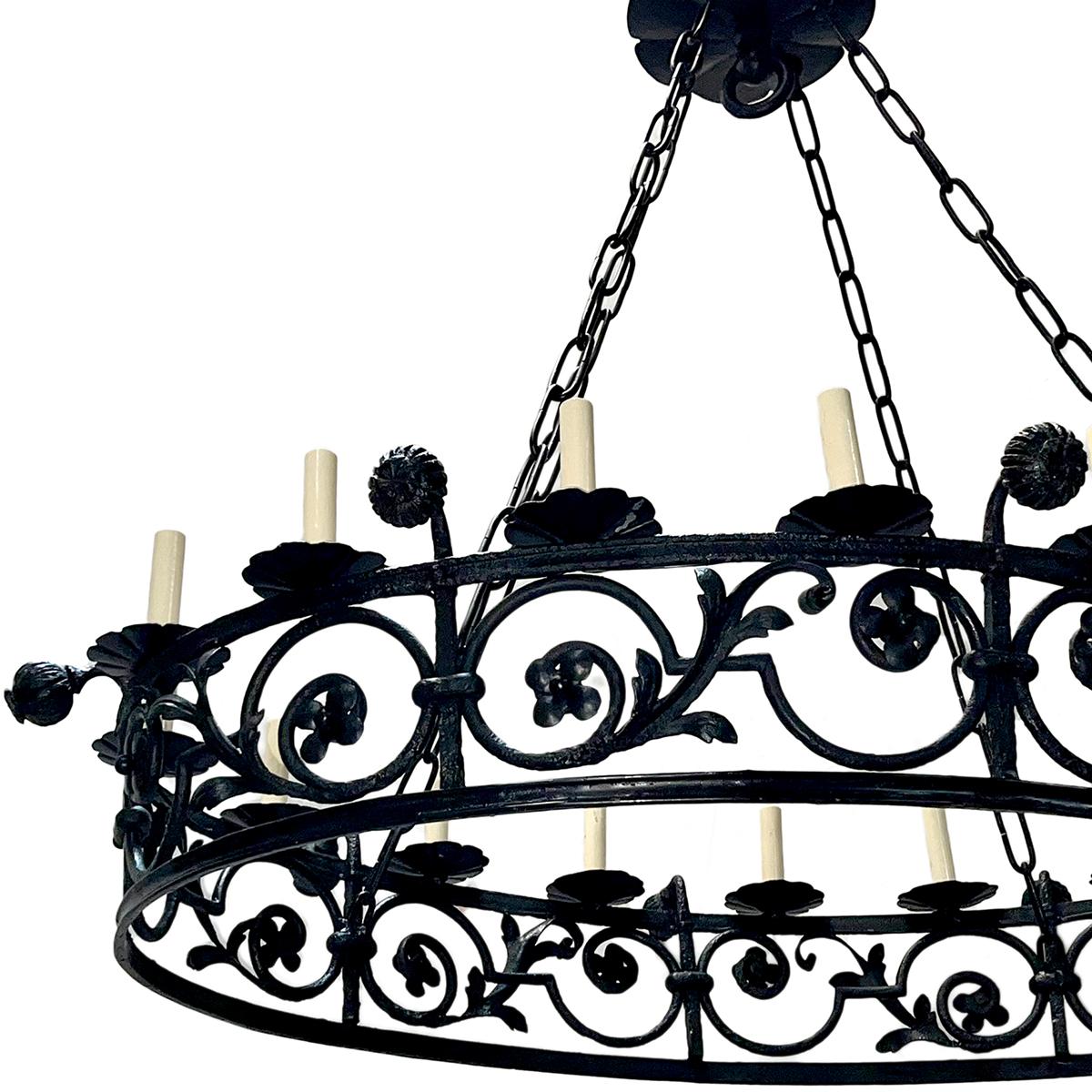 A circa 1900 French wrought iron chandelier with 16 lights.

Measurements:
Length: 48