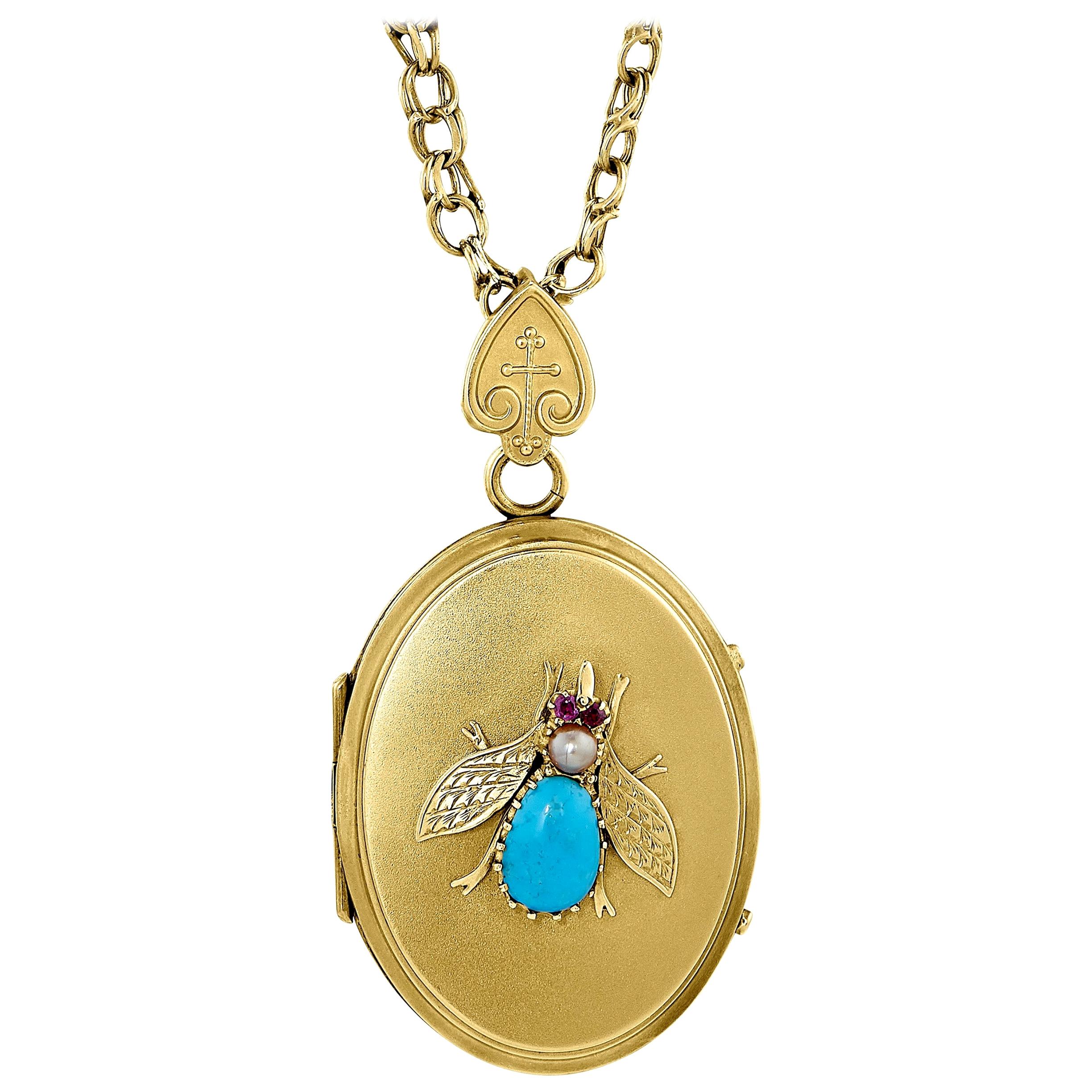 Antique Oval Locket Bee Design Comprised of Turquoise, Ruby and Pearl in 14kt For Sale