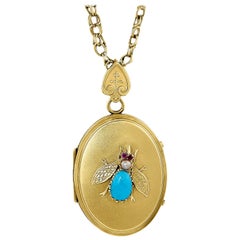 Antique Oval Locket Bee Design Comprised of Turquoise, Ruby and Pearl in 14kt