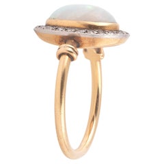Antique Oval Opal and Cluster Diamond Ring Late 19th Century