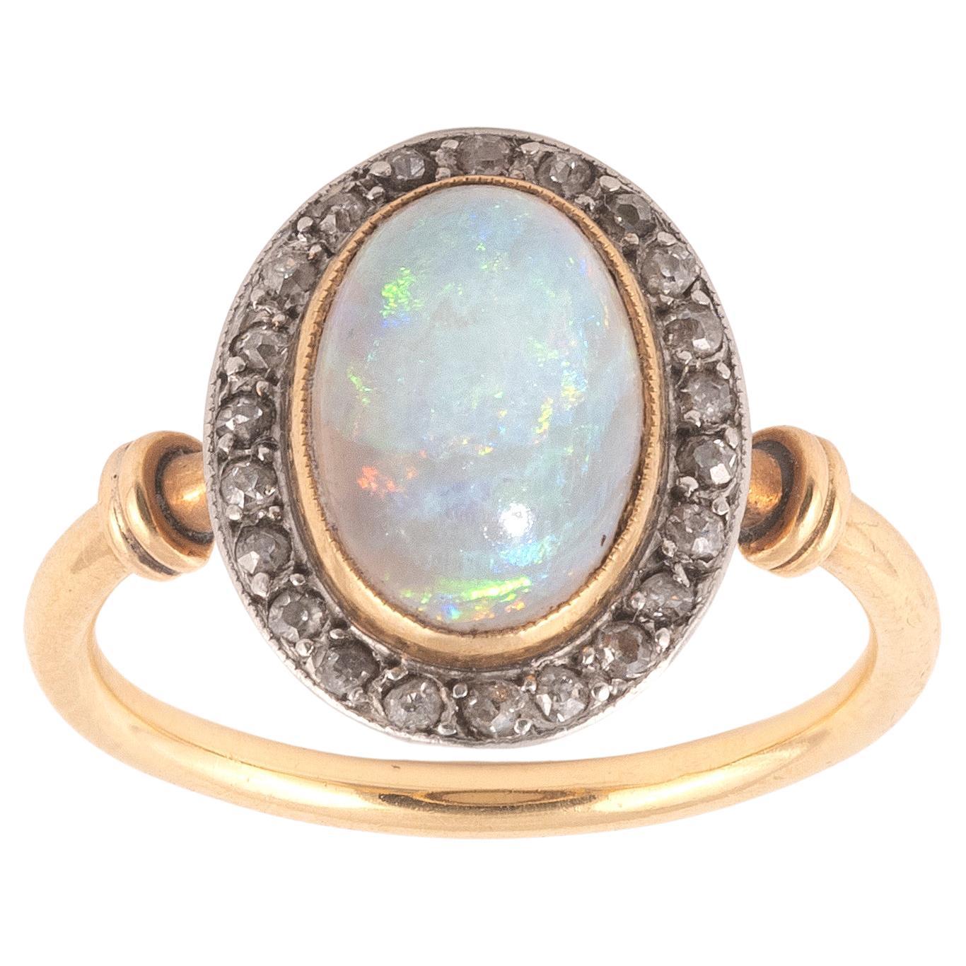 Antique Oval Opal and Cluster Diamond Ring Late 19th Century