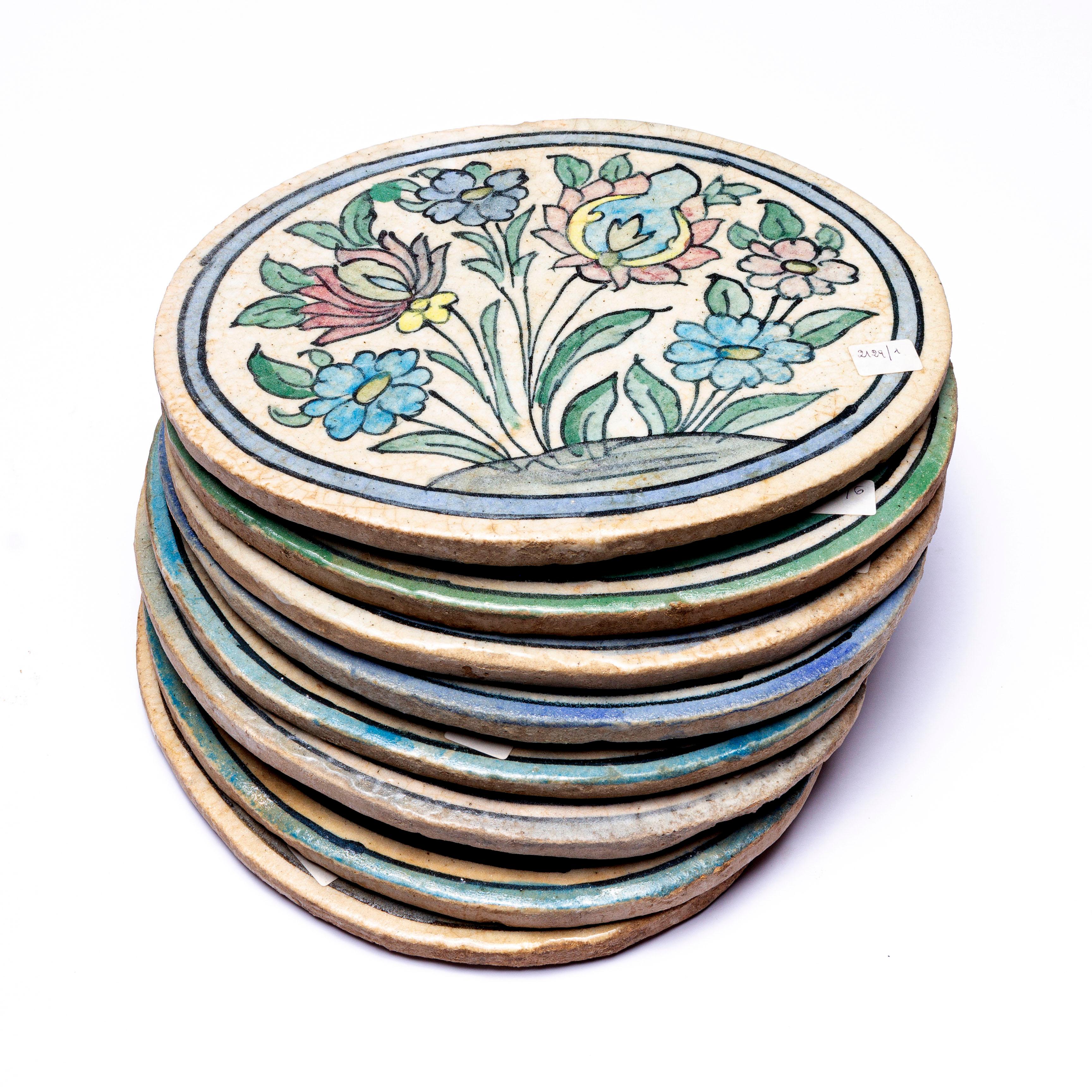 A rare series of round and oval tiles, all hand painted, very decorative on the wall. 
To use everywhere: on the garden wall, or kitchen. or bathroom. They are so beautiful and rare !
An idea: also walled each one on a door.
Sizes: nr. 5 + 2