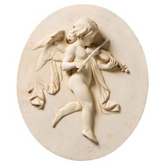 Antique Oval Plaster Relief Plaque of a Musical Putto