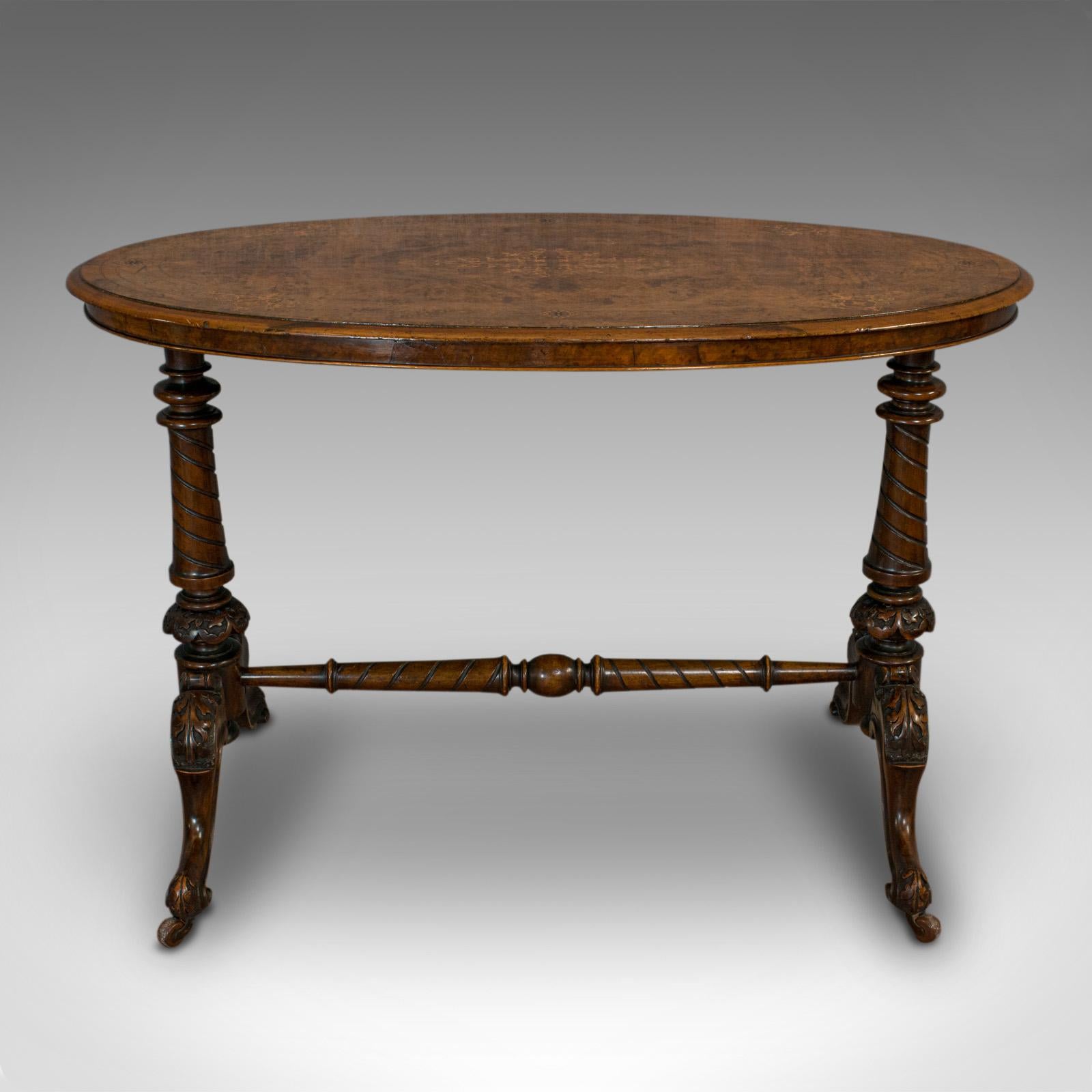 This is an antique oval table. An English, burr walnut centre or side table, dating to the Victorian period, circa 1870.

Beautiful figuring and craftsmanship
Displays a desirable aged patina
Burr walnut shows fine grain interest
Rich caramel
