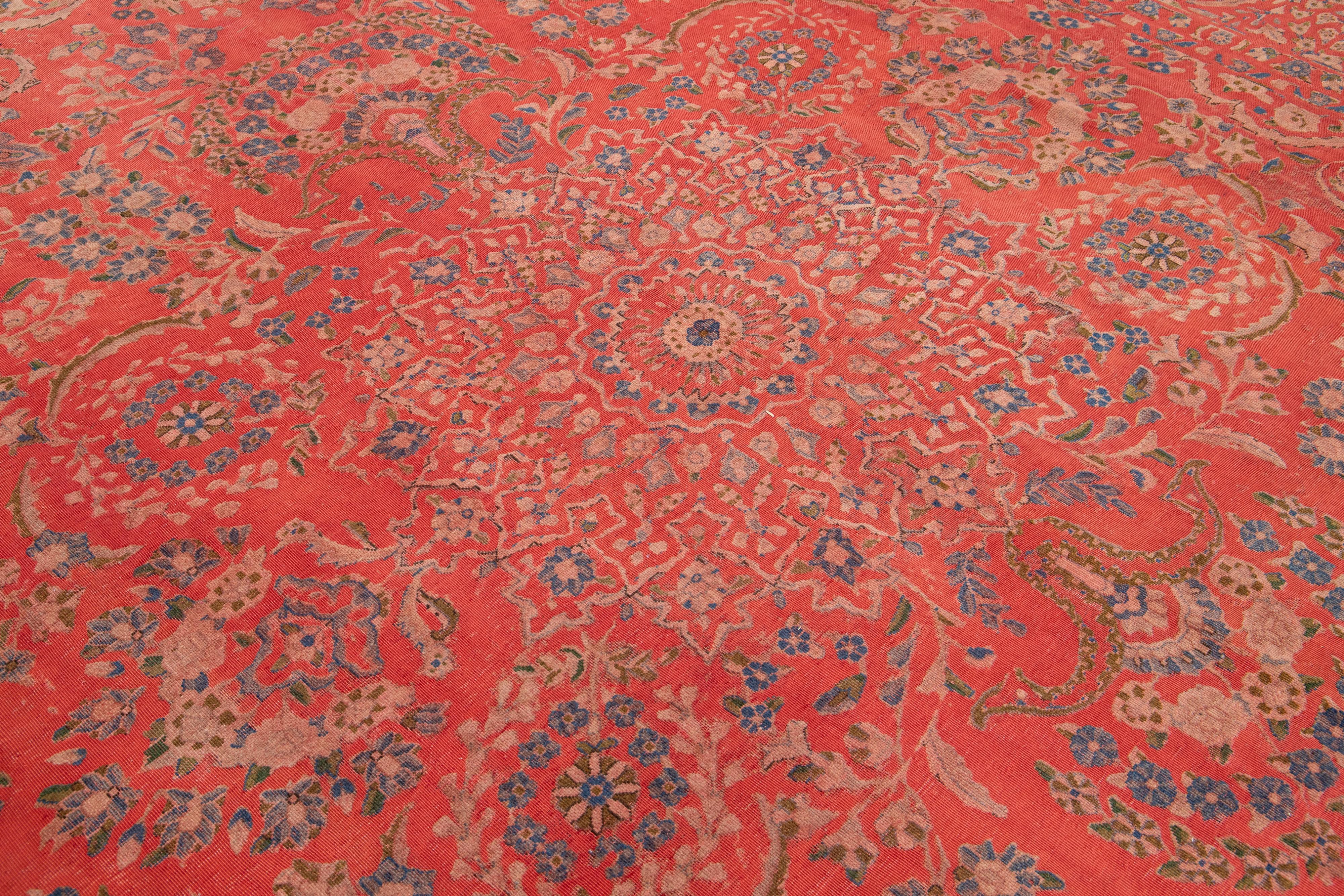 Antique  Overdyed Red Wool Rug With Rosette Design In Good Condition For Sale In Norwalk, CT