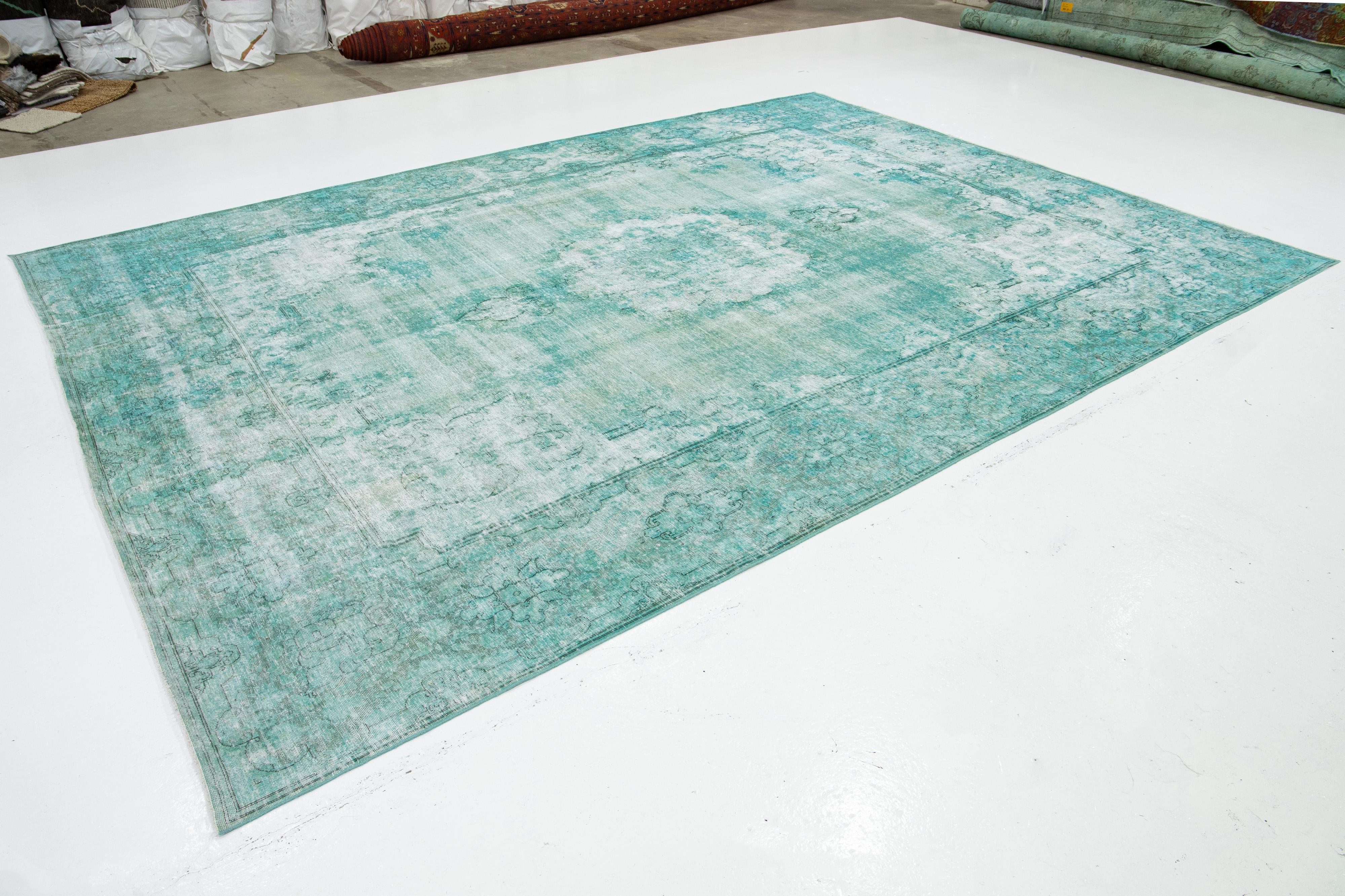 Hand-Knotted   Antique Overdyed Wool Rug With Allover Motif In Light Green For Sale