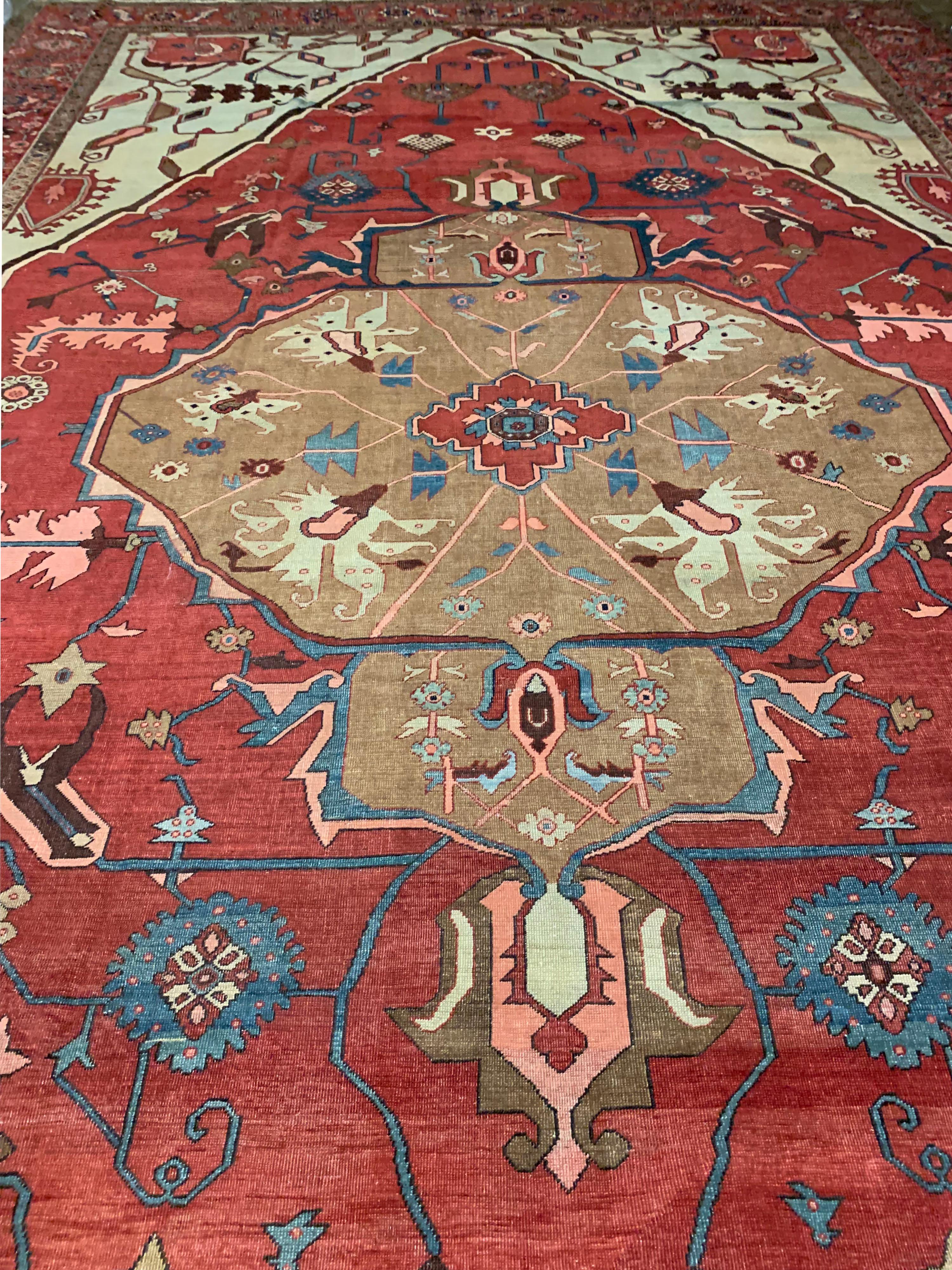 Antique Oversize Persian Heriz Serapi rug, 11'5 x 18'3. Serapi carpets are a quality designation for Heriz pieces of a firmer weave, shorter pile and finer quality. There is no village of Serapi among the thirty-odd towns in the Heriz weaving