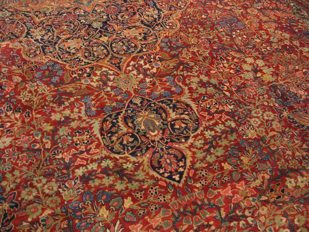 Pristine oversize Museum quality antique Farahan Sarouk dating from the 1880s-1900s measuring 16.10 x 26 ft.

Persian Farahan Sarouk rugs were woven in the village of Sarouk but these carpets given the name “Farahan” as a distinction for their