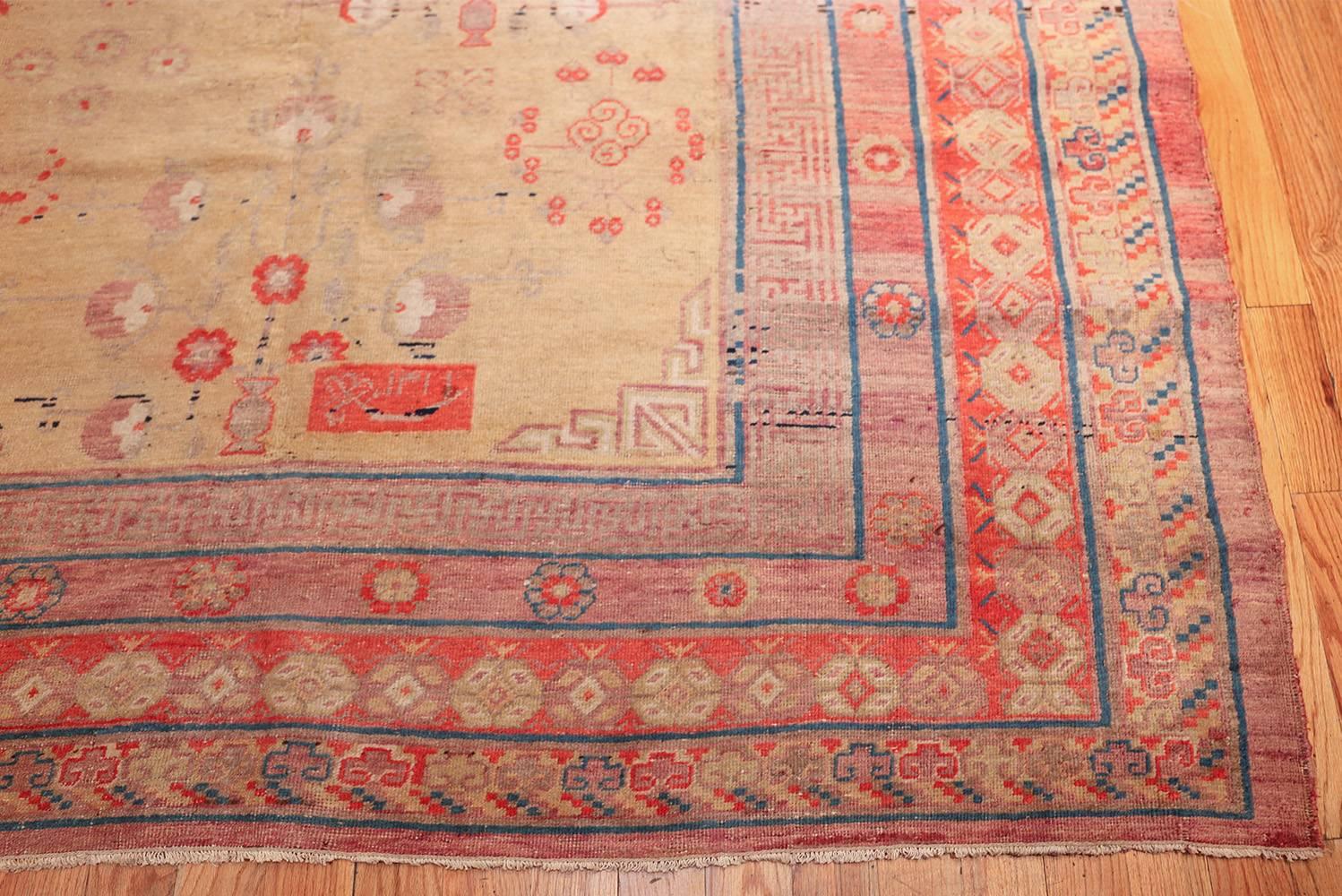 Breathtakingly beautiful and quite rare antique oversize Samarkand pomegranate design Khotan rug, country of origin: East Turkestan, date circa early-19th century. Size: 11 ft. 3 in x 19 ft. 6 in (3.43 m x 5.94 m).