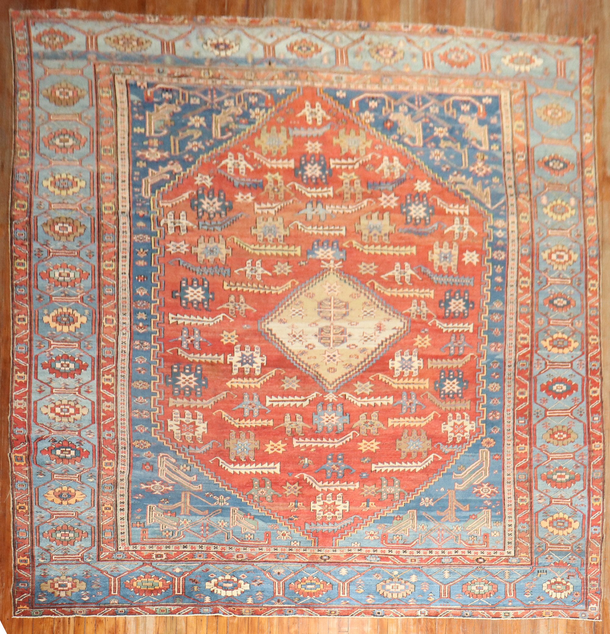 High collectible-quality large room size tribal early 20th century Persian Bakshaish rug. The harmonious colors, skillful geometry, and weavers craftsmanship make this rug an absolute work of art.

Measures: 11'4