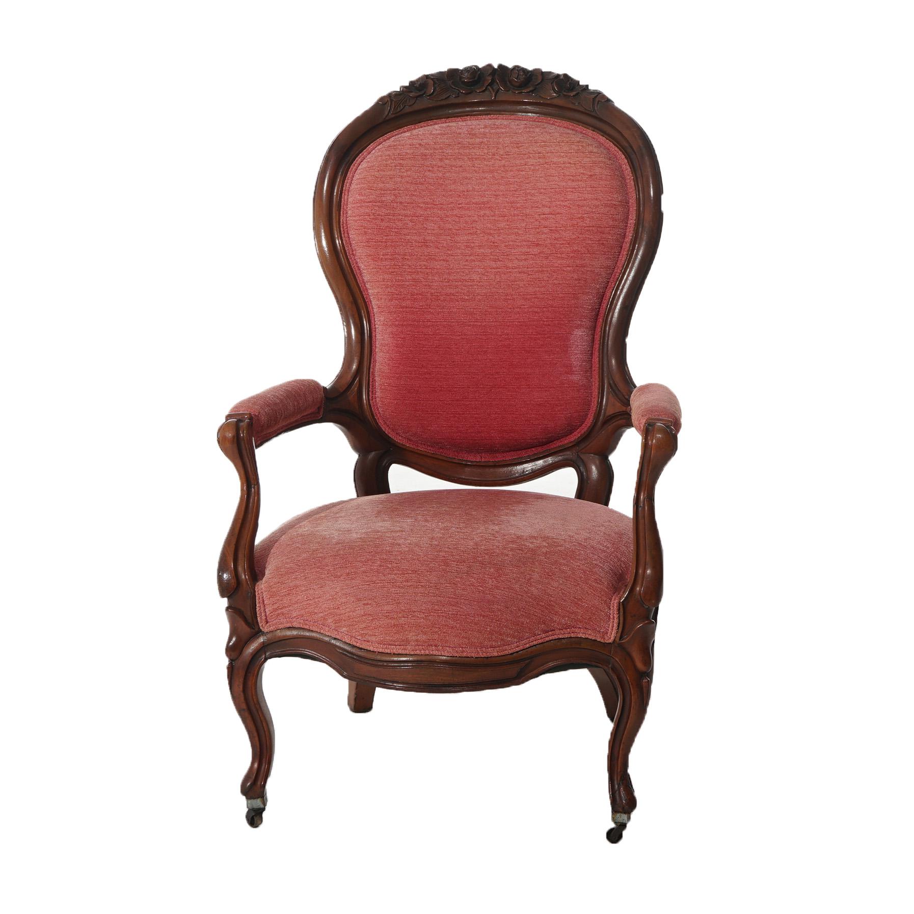 ***Ask About Reduced In-House Delivery Rates - Reliable Professional Service & Fully Insured***
A Victorian oversized armchair offers walnut frame with deeply carved floral crest over upholstered back, seat and arms, raised on cabriole legs,