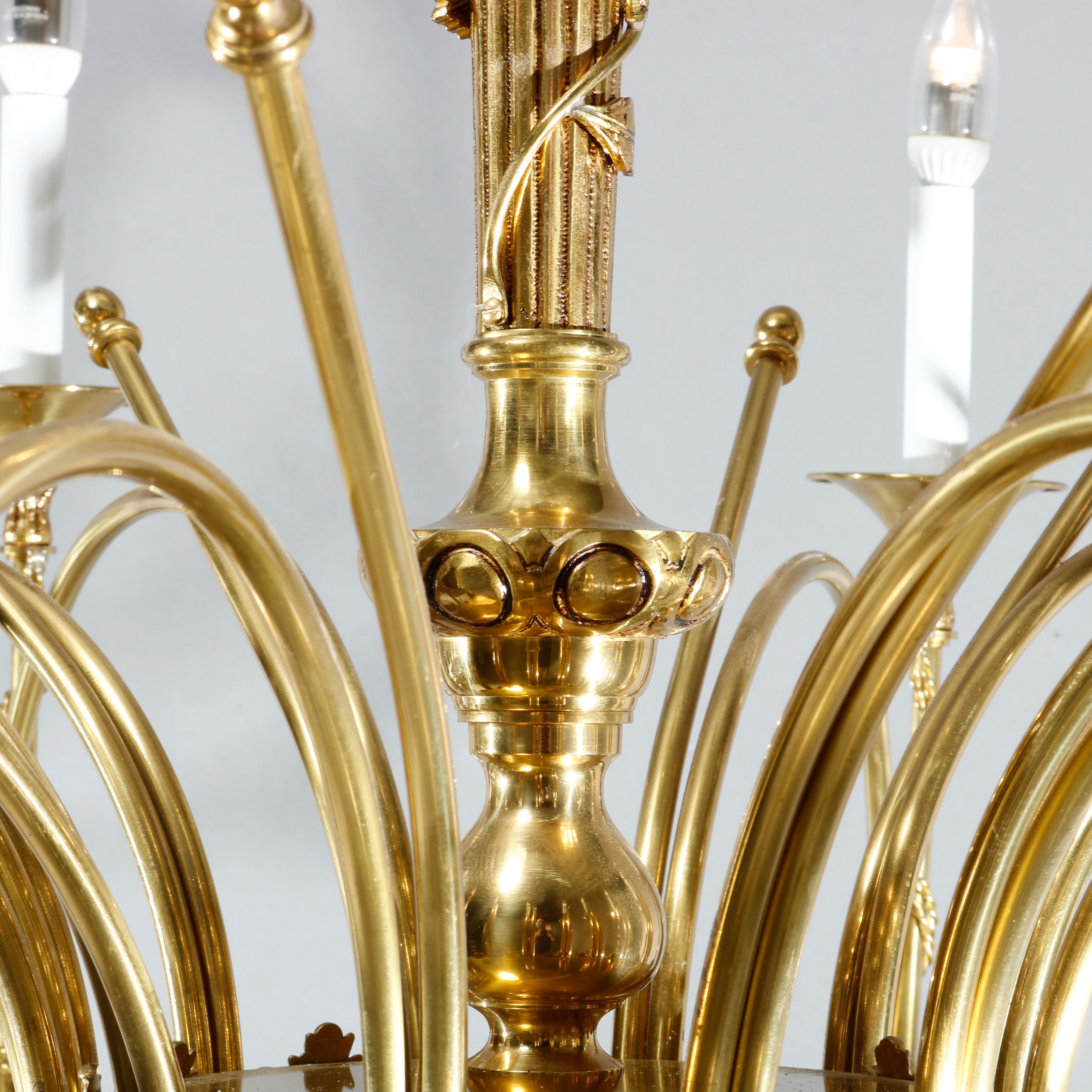 Cast Antique Oversized French Empire Brass Trumpet Form Chandelier, 20th Century