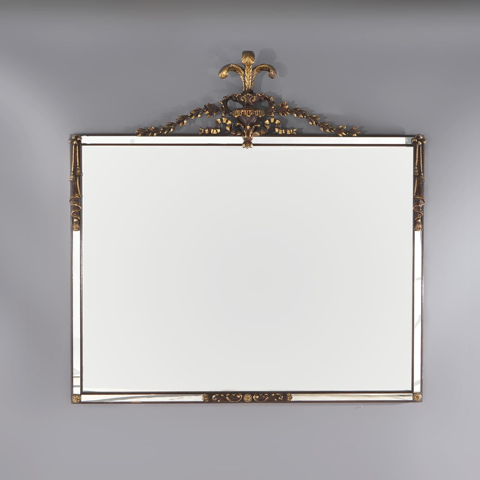 ***Ask About Reduced In-House Shipping Rates - Reliable Service & Fully Insured***

A large French Louis XVI style wall mirror offers fleur de lis and foliate crest over mirror with flanking drape elements, c1920

Measures - 50.25