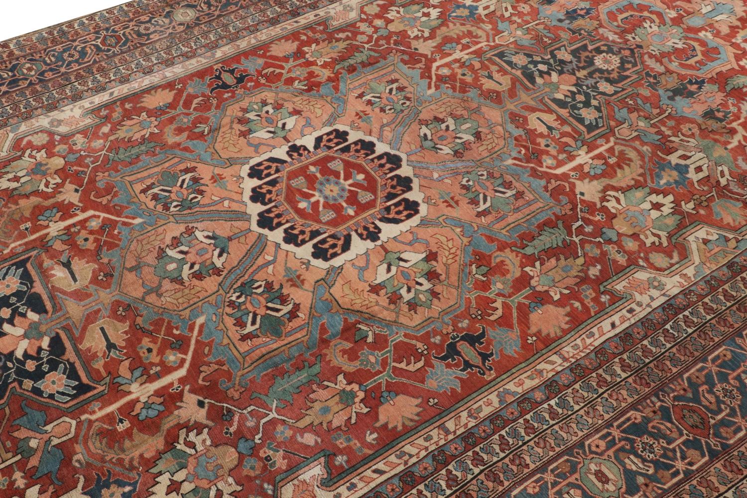 This antique 13x23 Persian rug is an exceptionally rare palace-sized carpet of Heriz provenance—hand-knotted in wool circa 1900-1910.

On the Design:

Connoisseurs will note Heriz rugs are among the most coveted Persian lineage, with few