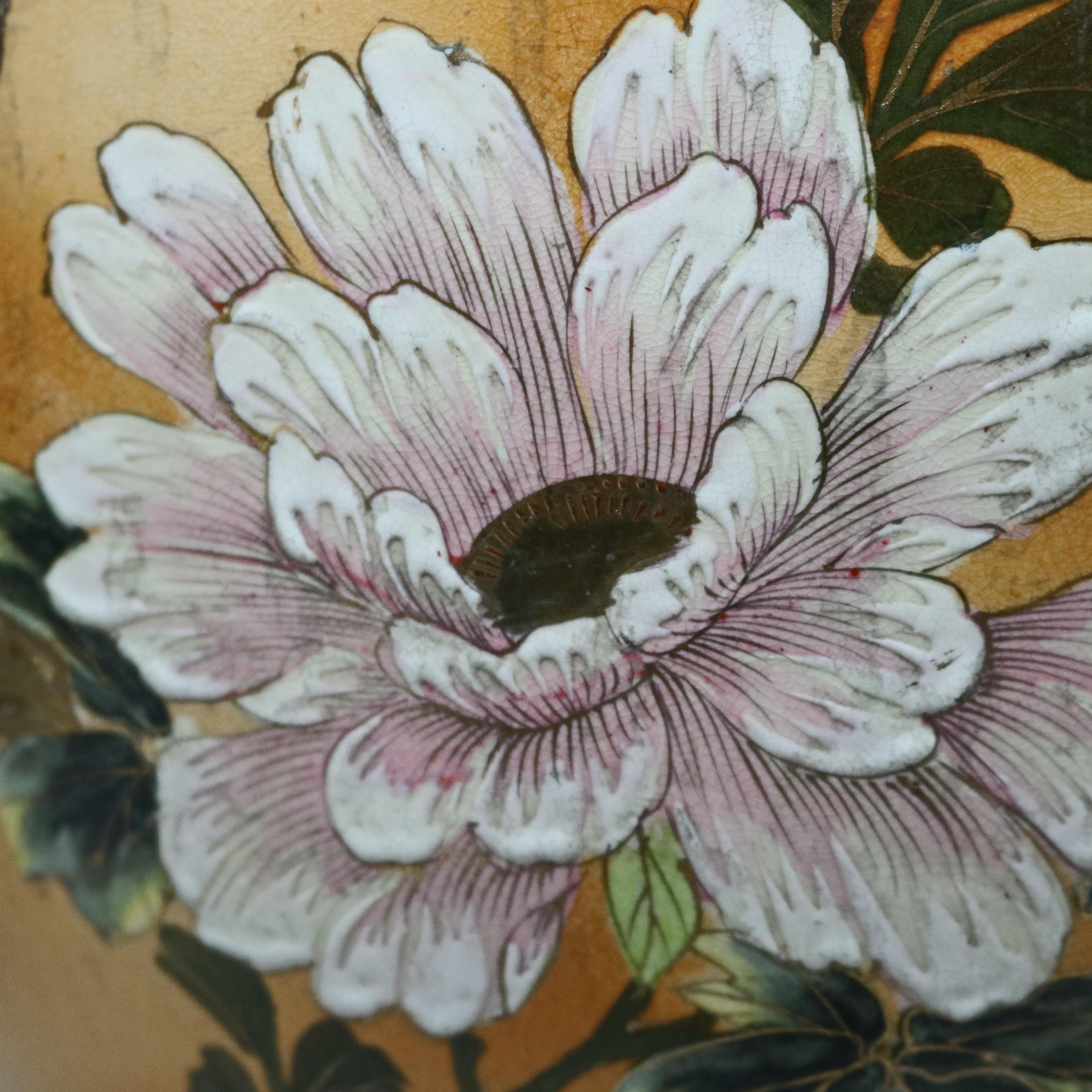 An antique and oversized Asian floor vase offers porcelain construction in urn form with hand painted floral decoration, circa 1900

Measures - 29.5