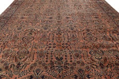 Antique Oversized Sarouk Persian Rug in Pink with Floral Patterns