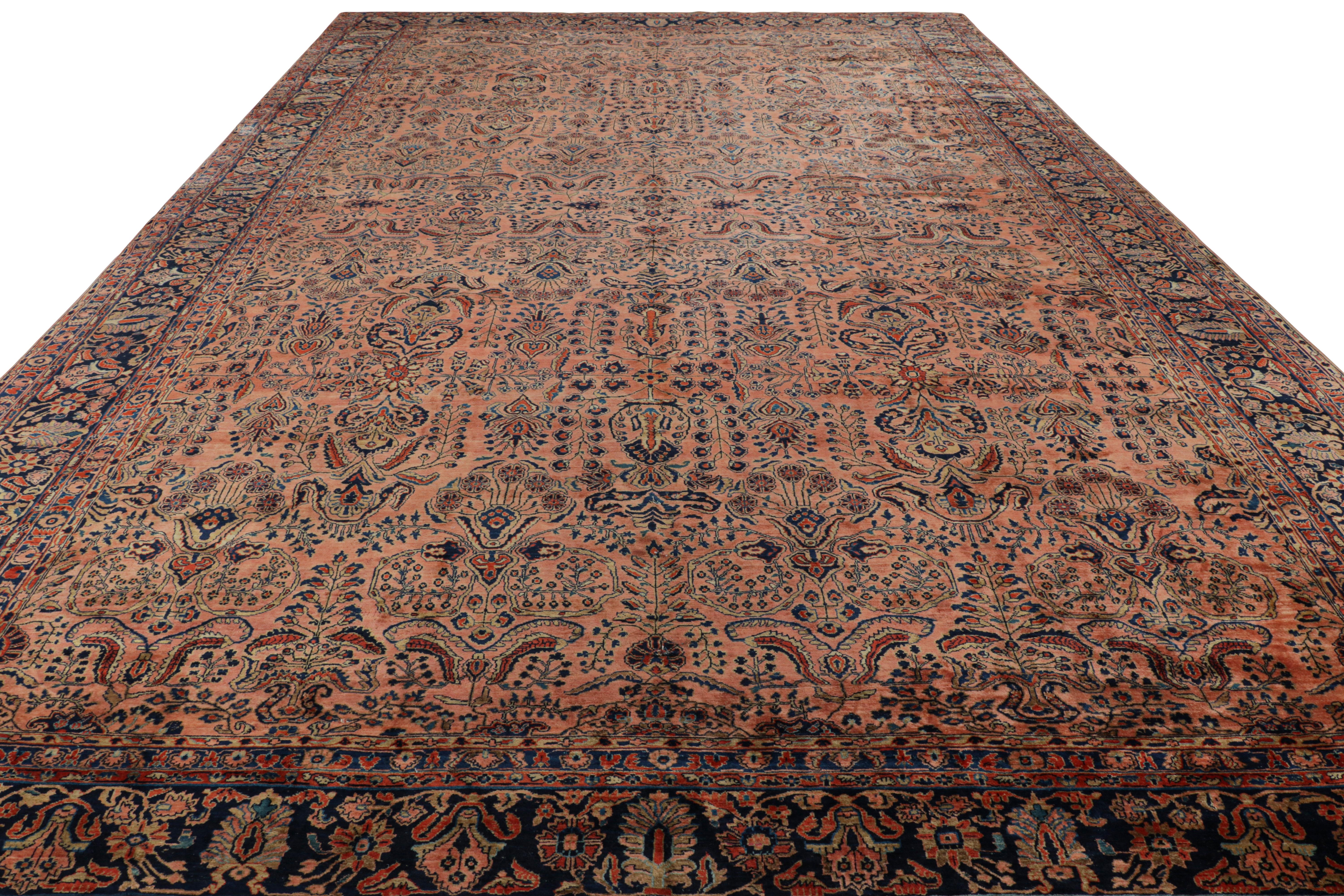 Antique Oversized Sarouk Persian Rug in Pink with Floral Patterns In Good Condition For Sale In Long Island City, NY