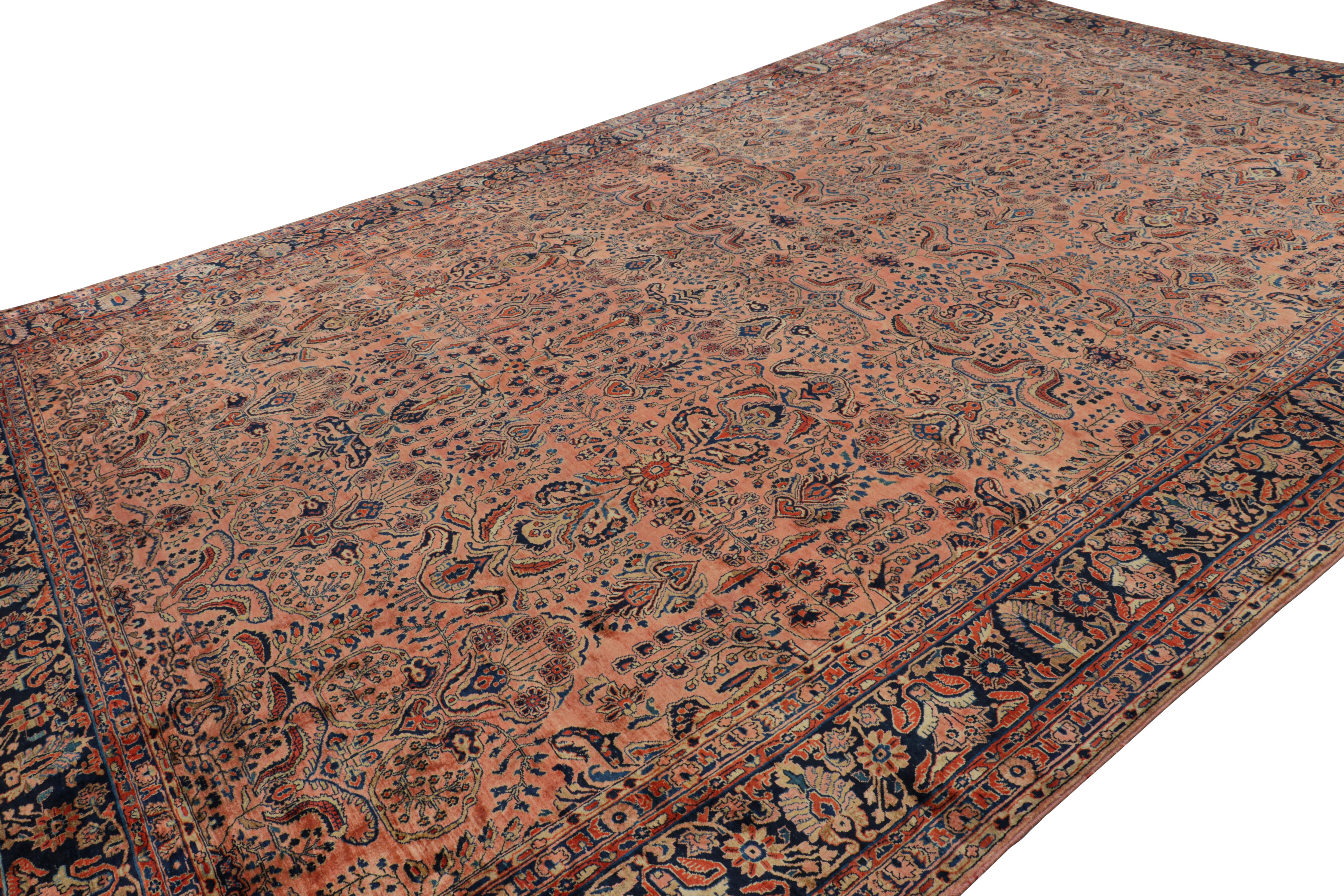 Early 20th Century Antique Oversized Sarouk Persian Rug in Pink with Floral Patterns For Sale