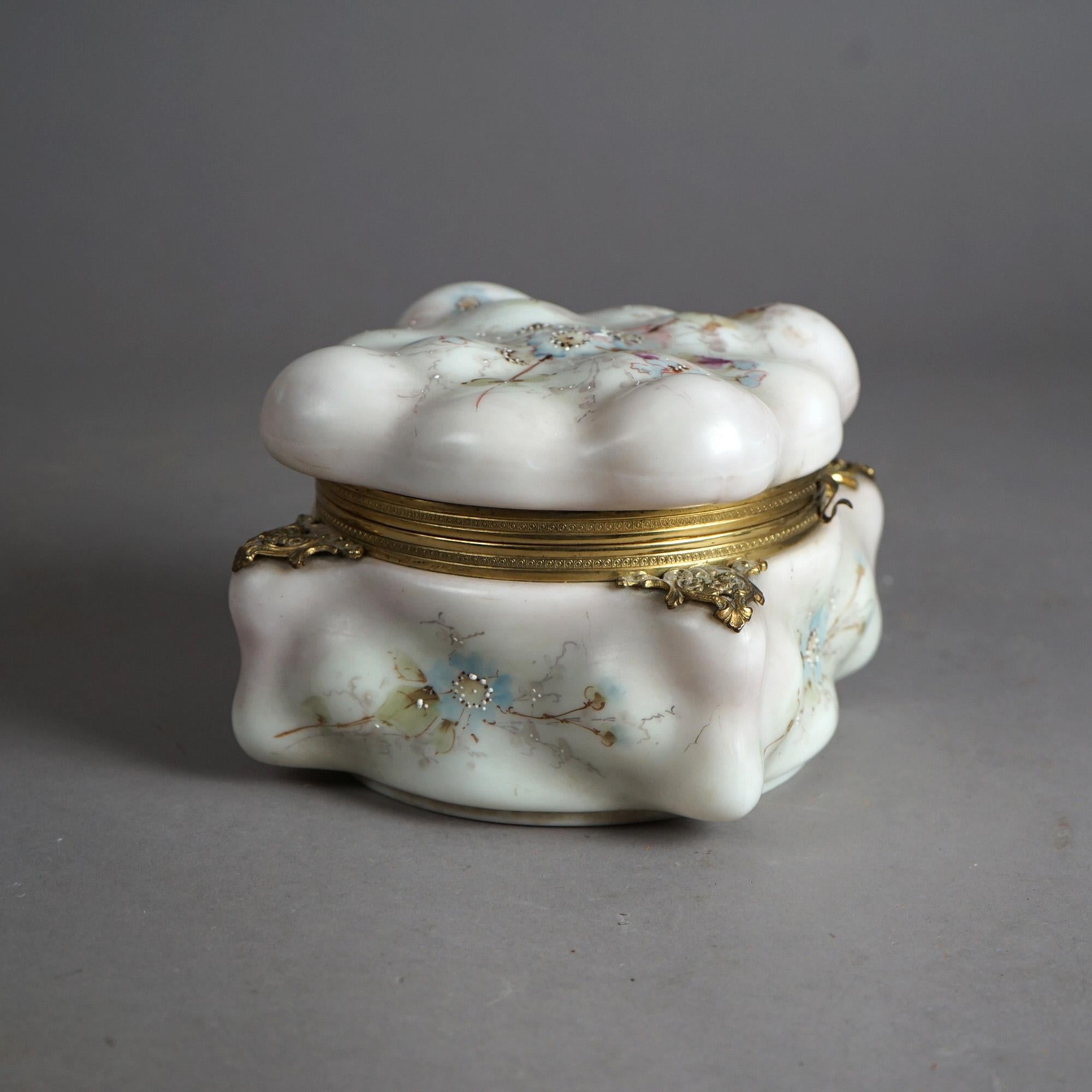 An antique and large Victorian Wavecrest dresser box offers glass construction with enameled floral design and hinged lid opening to satin lined interior, 19th century

Measures - 5.5