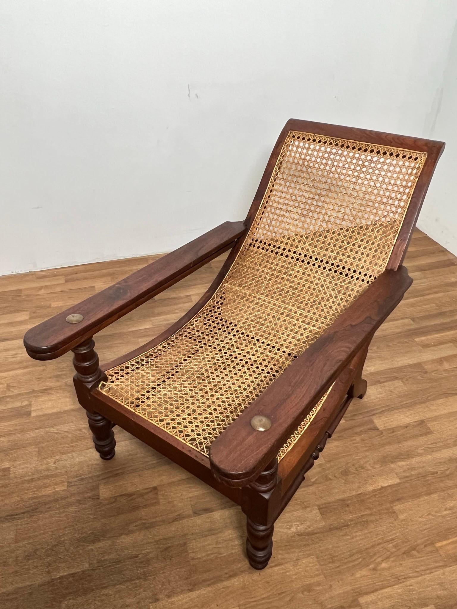 Anglo-Indian Antique Paddle Arm British Colonial Plantation Lounge Chair For Sale