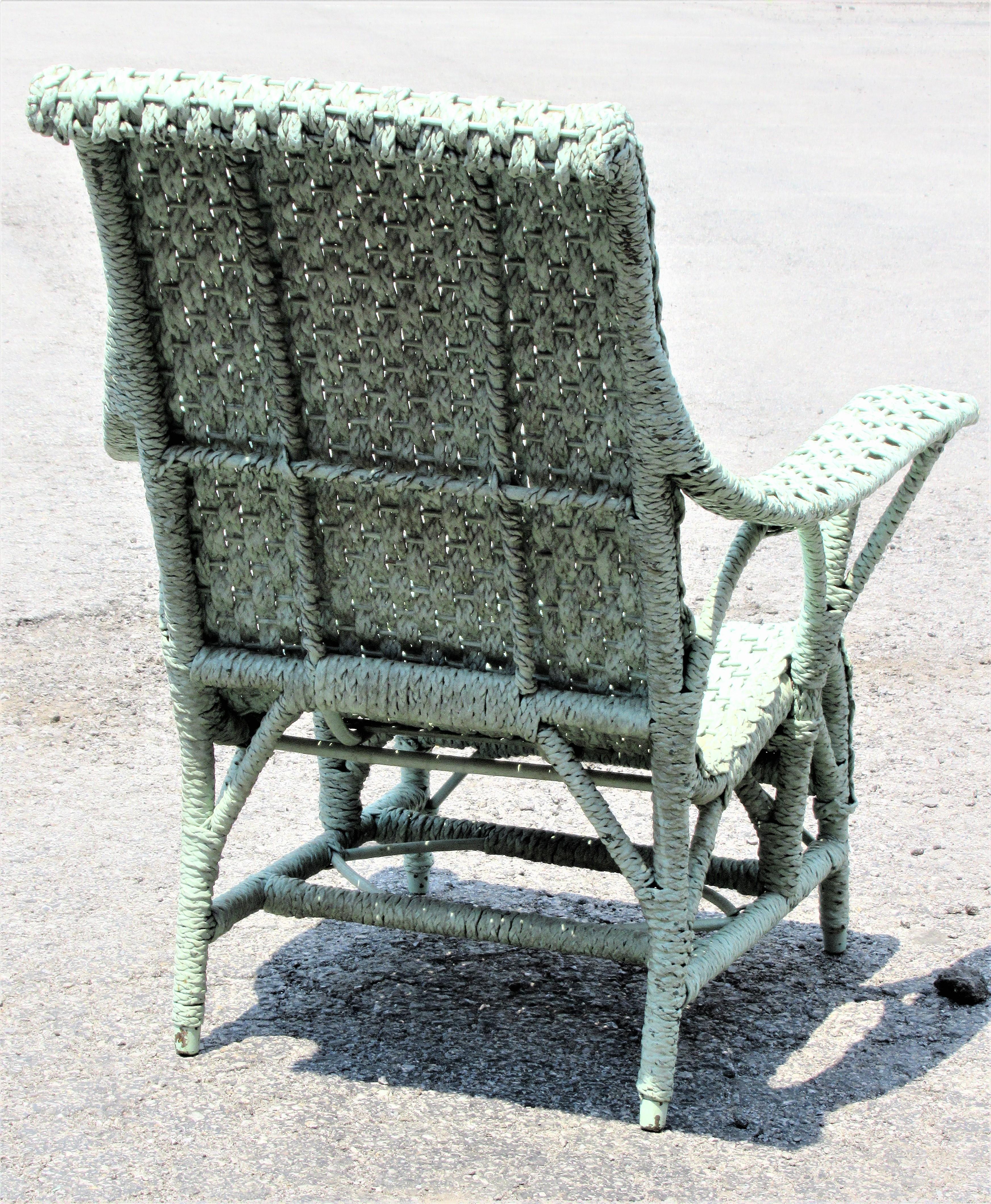 Antique Paddle Arm Wicker Lounge Chair In Good Condition In Rochester, NY