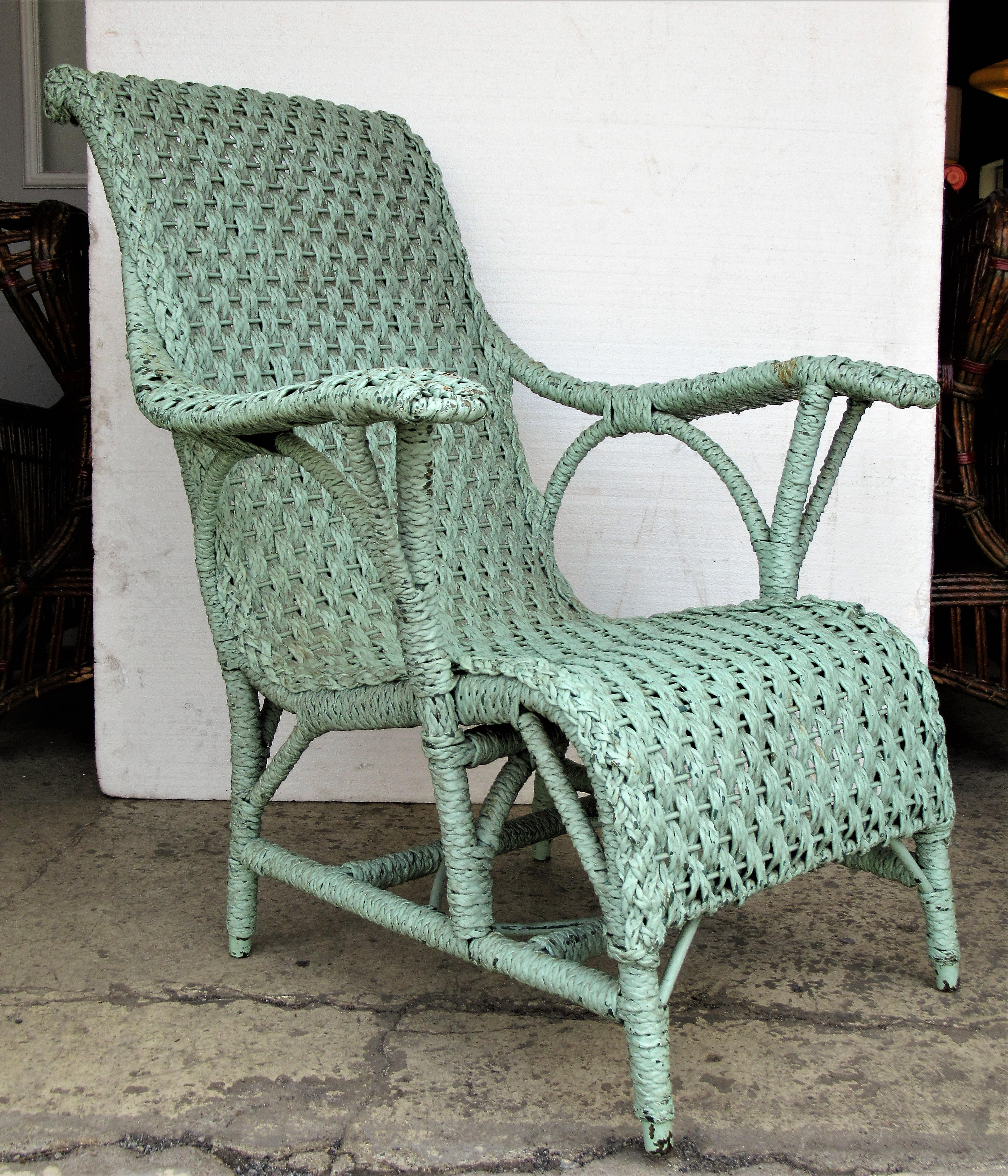 20th Century Antique Paddle Arm Wicker Lounge Chair