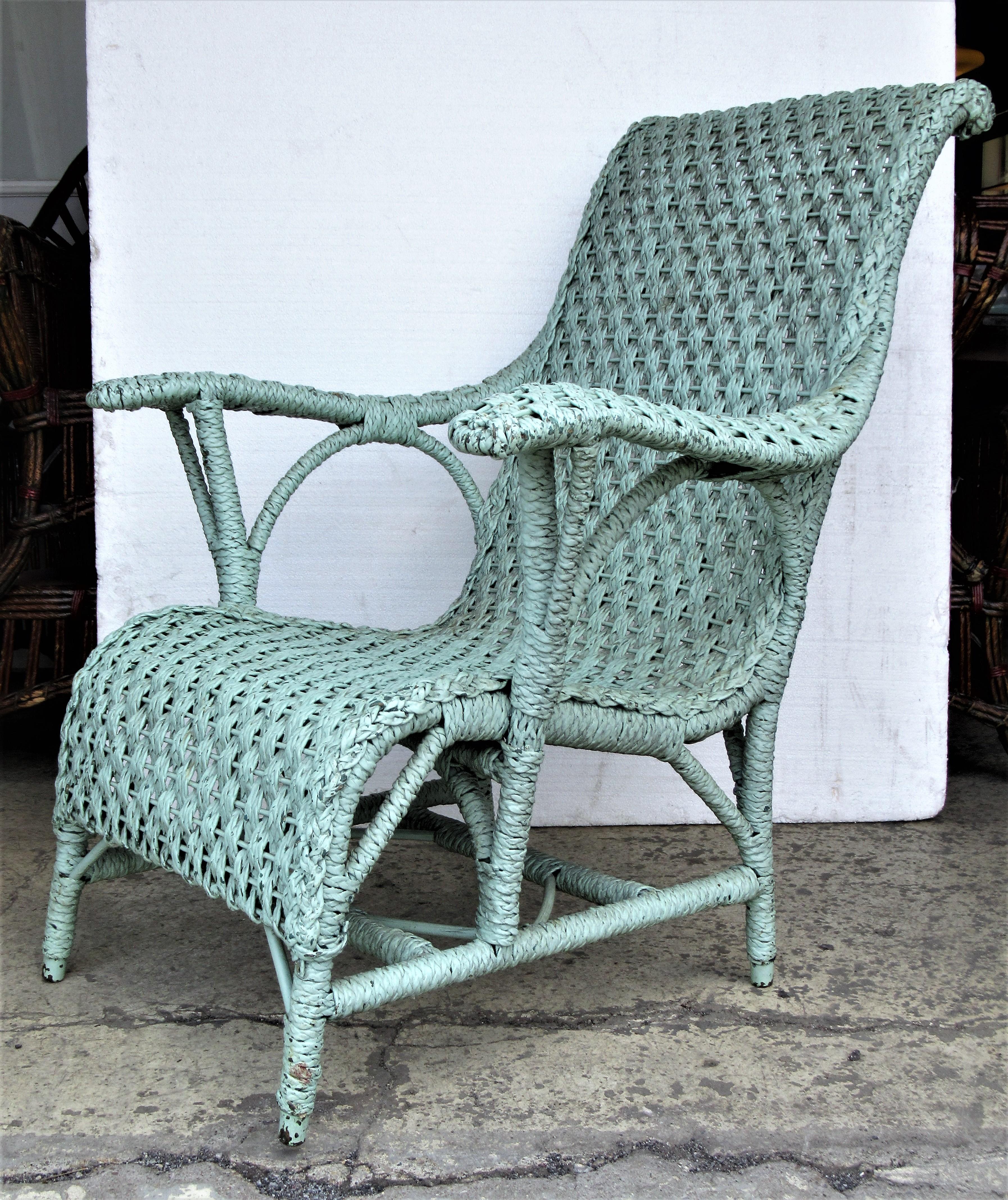 Antique Paddle Arm Wicker Lounge Chair 1