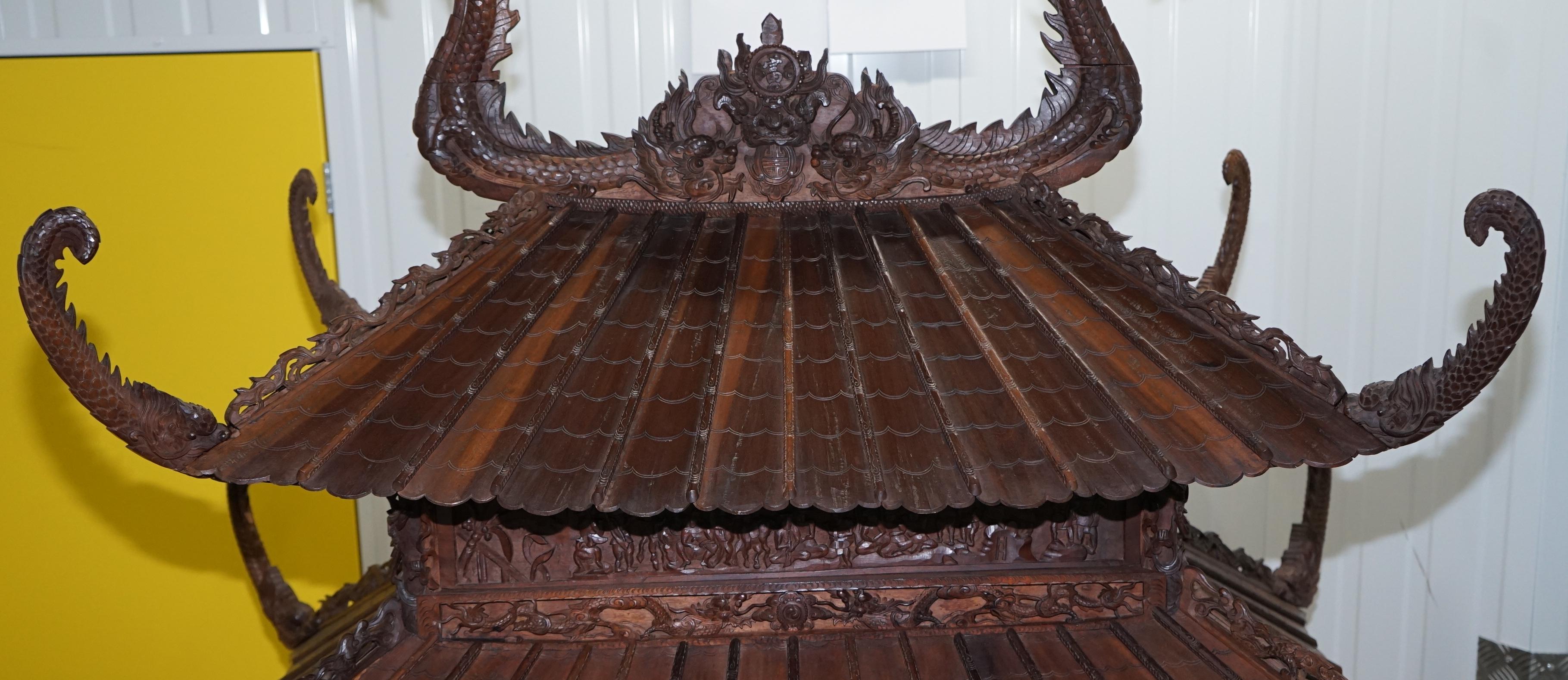Chinese Export Antique Pagoda Hand Carved Top to Bottom Chinese Temple Cabinet Silk Inside