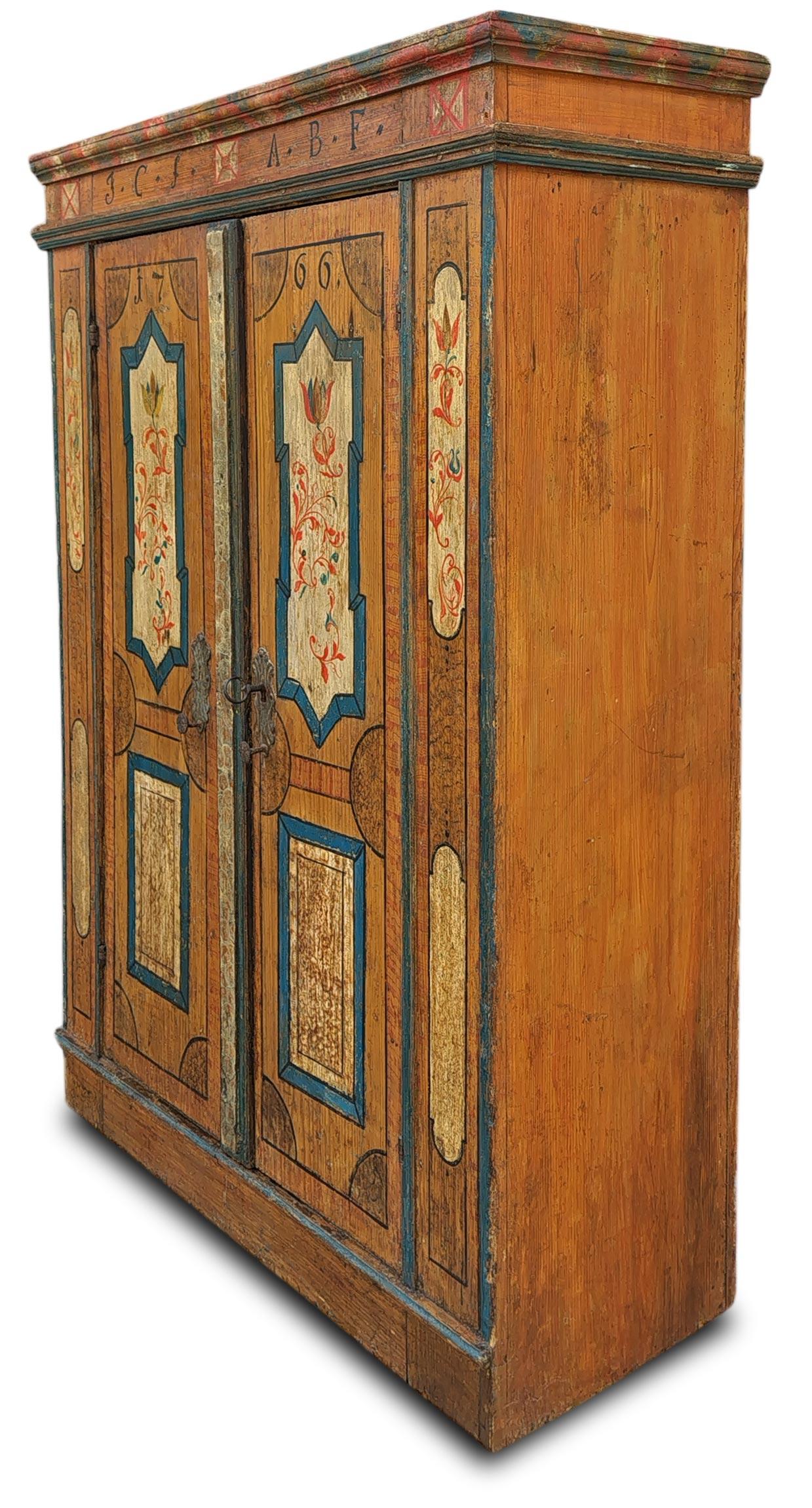 Antique Painted Wardrobe with Flowers Dated 1766

Period: 1766 (dated)
Origin: European Alps
Wood essence: Fir

Dimension:

Centimeters
Height: 169 cm
Width: 123 cm (128 cm to the corners)
Depth: 45 cm (48 cm to the corners)

Inches
Height: 66.5