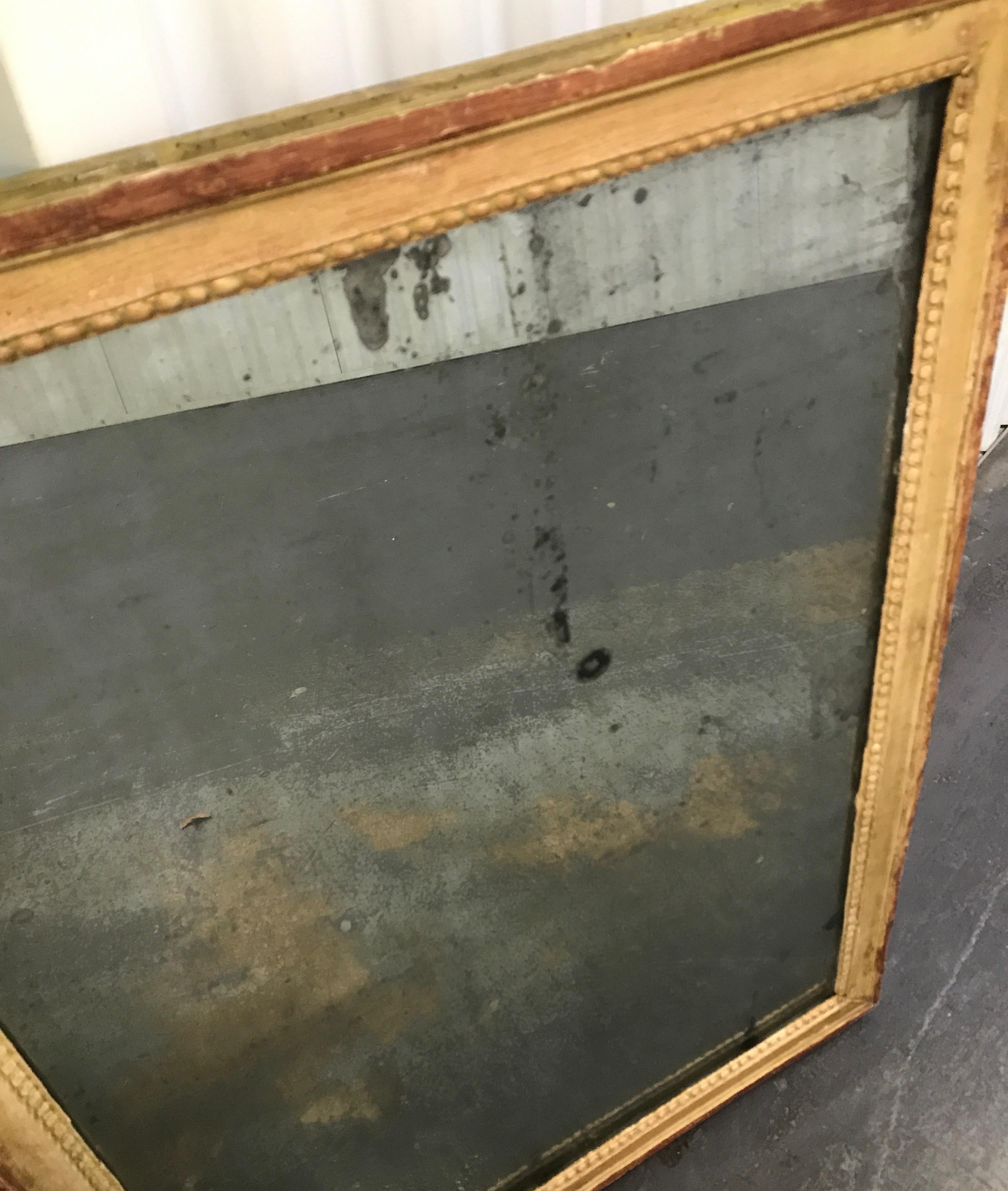 Antique Swedish mirror with original paint and mirror plate.