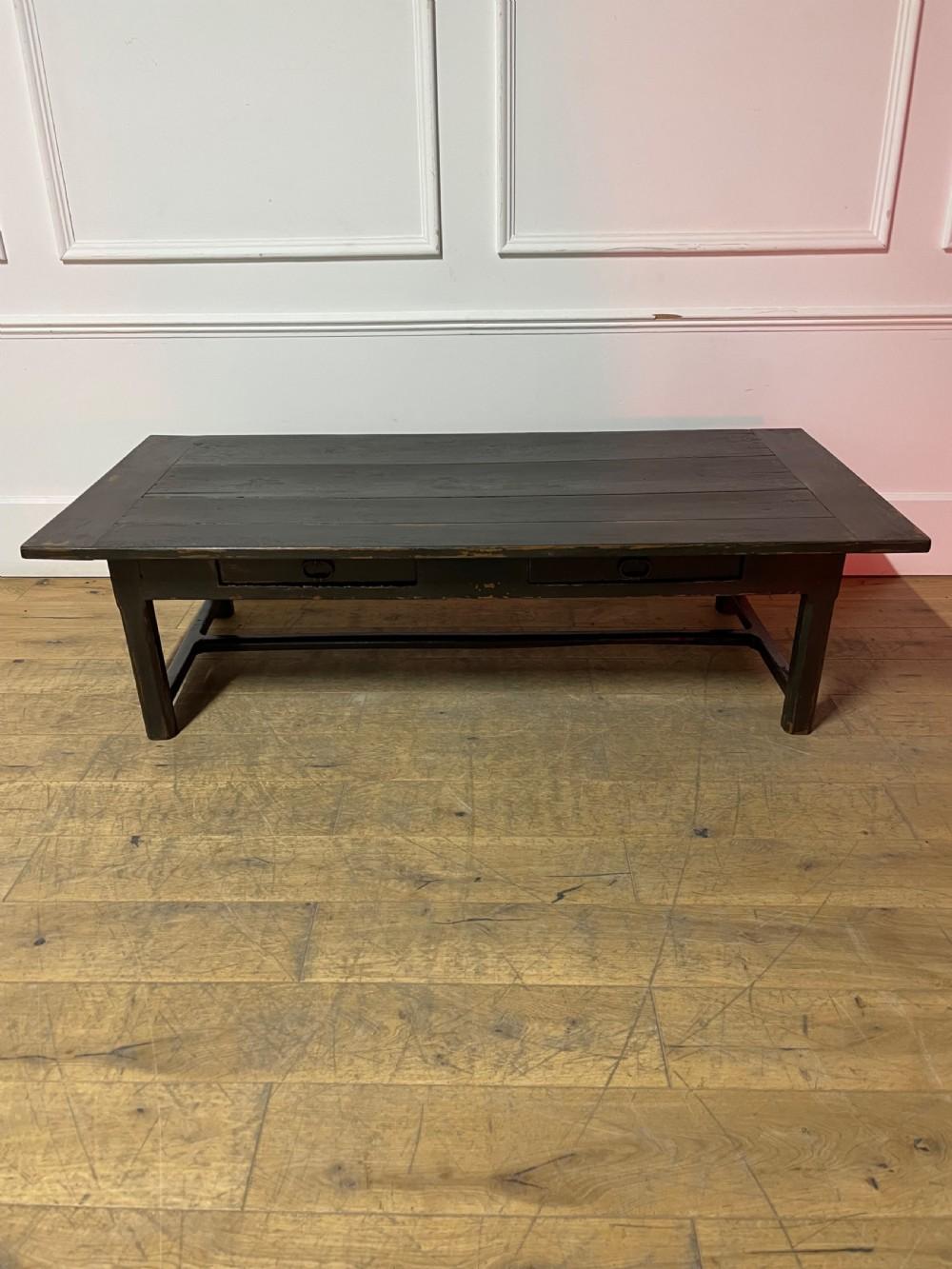 19th century oak farmhouse coffee table, two short drawers.French circa 1880.Painted with a black chalk paint having a distressed finish.
Height 19 inches or 48 cms
Length 69 inches or 176 cms
Depth 33.5 inches or 85 cms