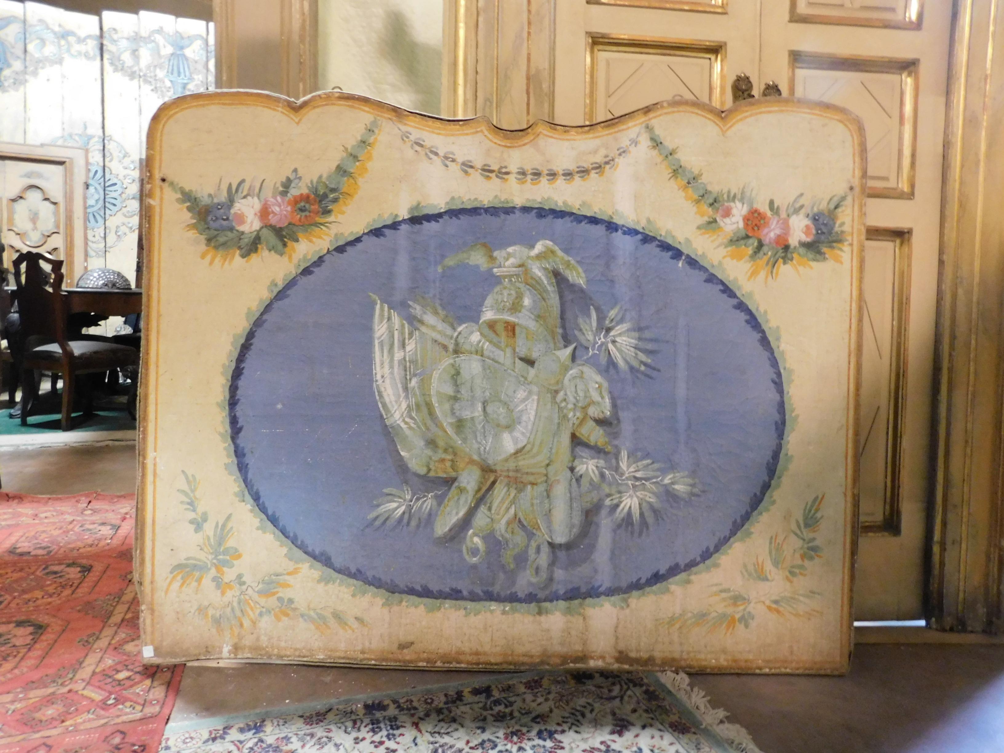 Antique painted overdoor, hand-painted panel on canvas with wavy-shaped frame, bright colors and typical shapes of the time, built in the 18th century in Italy, it was placed above a door as was fashionable at the time. Today it is used as a