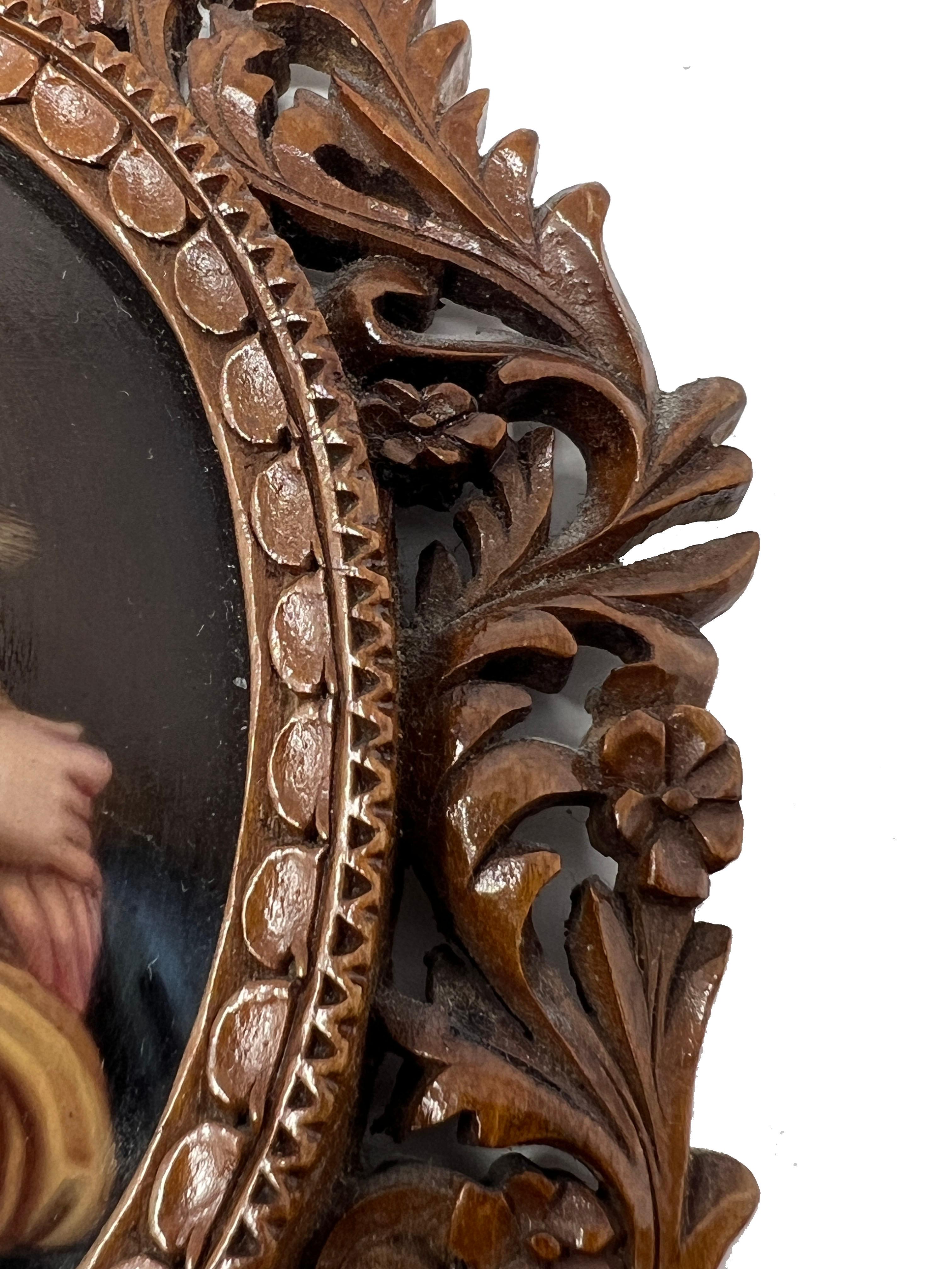 Hand-Carved Antique Painted Porcelain Madonna & Child in Hand Carved Walnut Frame Circa 1900 For Sale