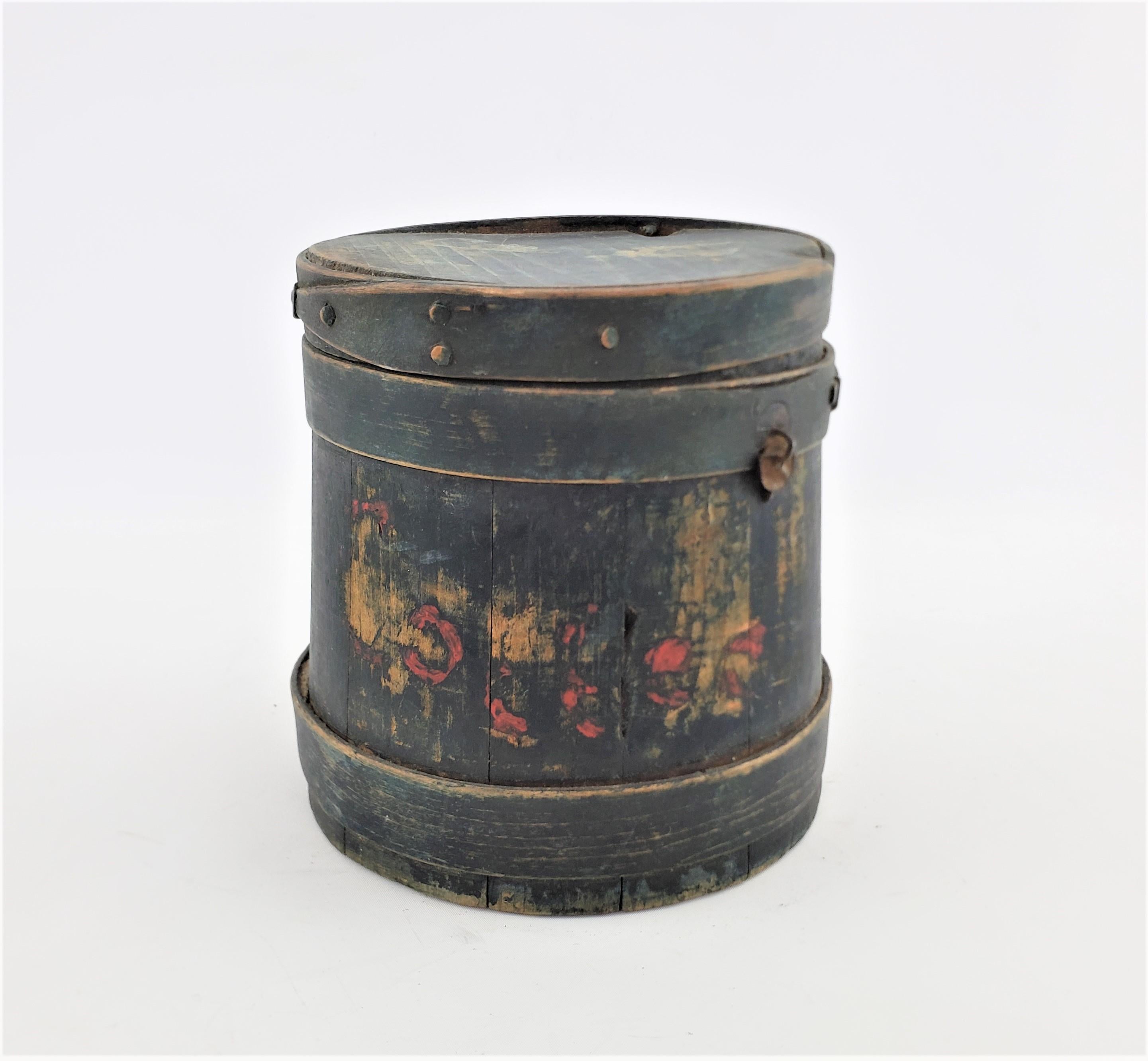 This folk art finger staved covered sugar bucket or firkin shows no indication of a specific maker, or country of origin. We presume this covered bucket originated from Europe, possibly Dutch or English and dates to approximately 1900-1920. The