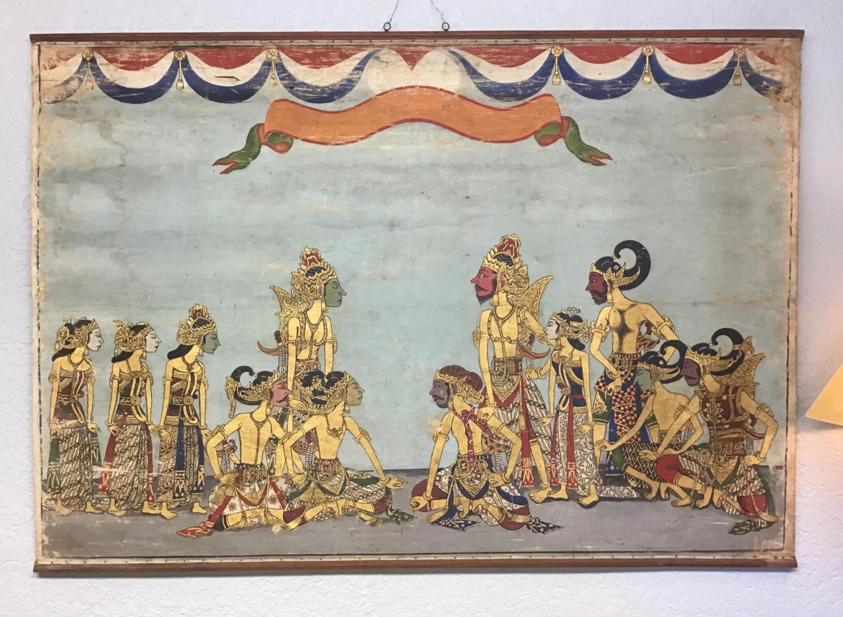 An antique painted cloth panel from India. May have been a back drop for a theater or a large wall hanging. It has a wonderful worn old patina and would add character to any setting.